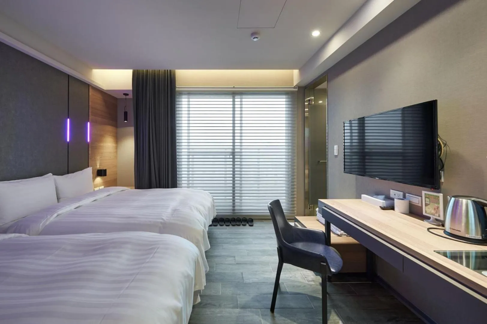 Bed in KIWI SHARE HOTEL ZHONGLI