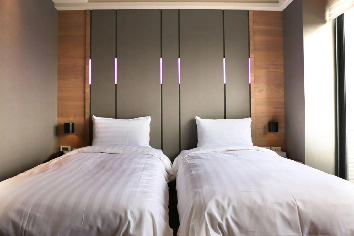 Bed in KIWI SHARE HOTEL ZHONGLI