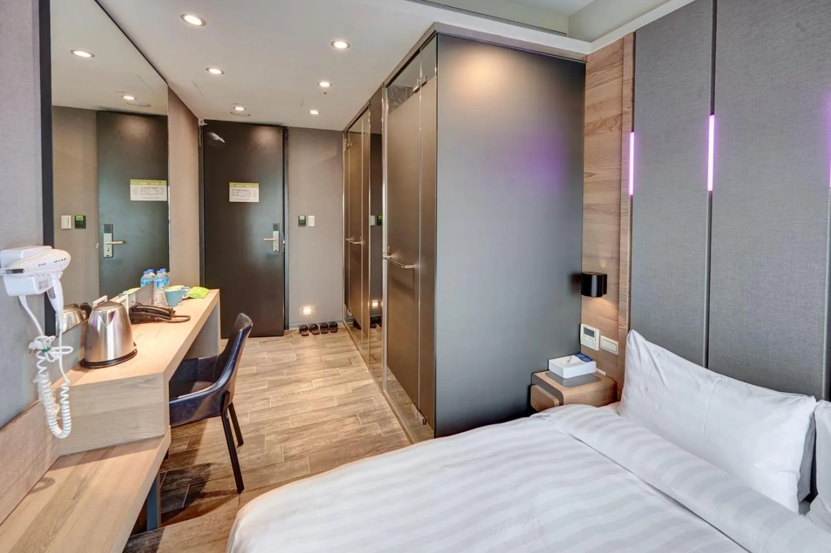 Bed in KIWI SHARE HOTEL ZHONGLI