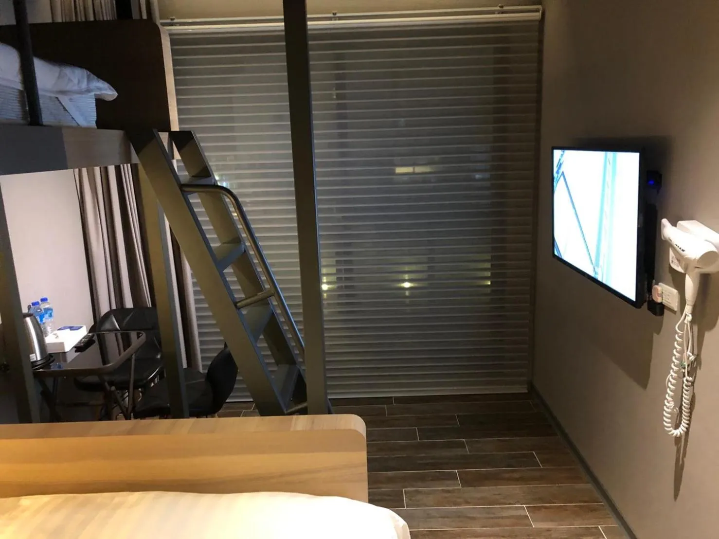 Bed in KIWI SHARE HOTEL ZHONGLI