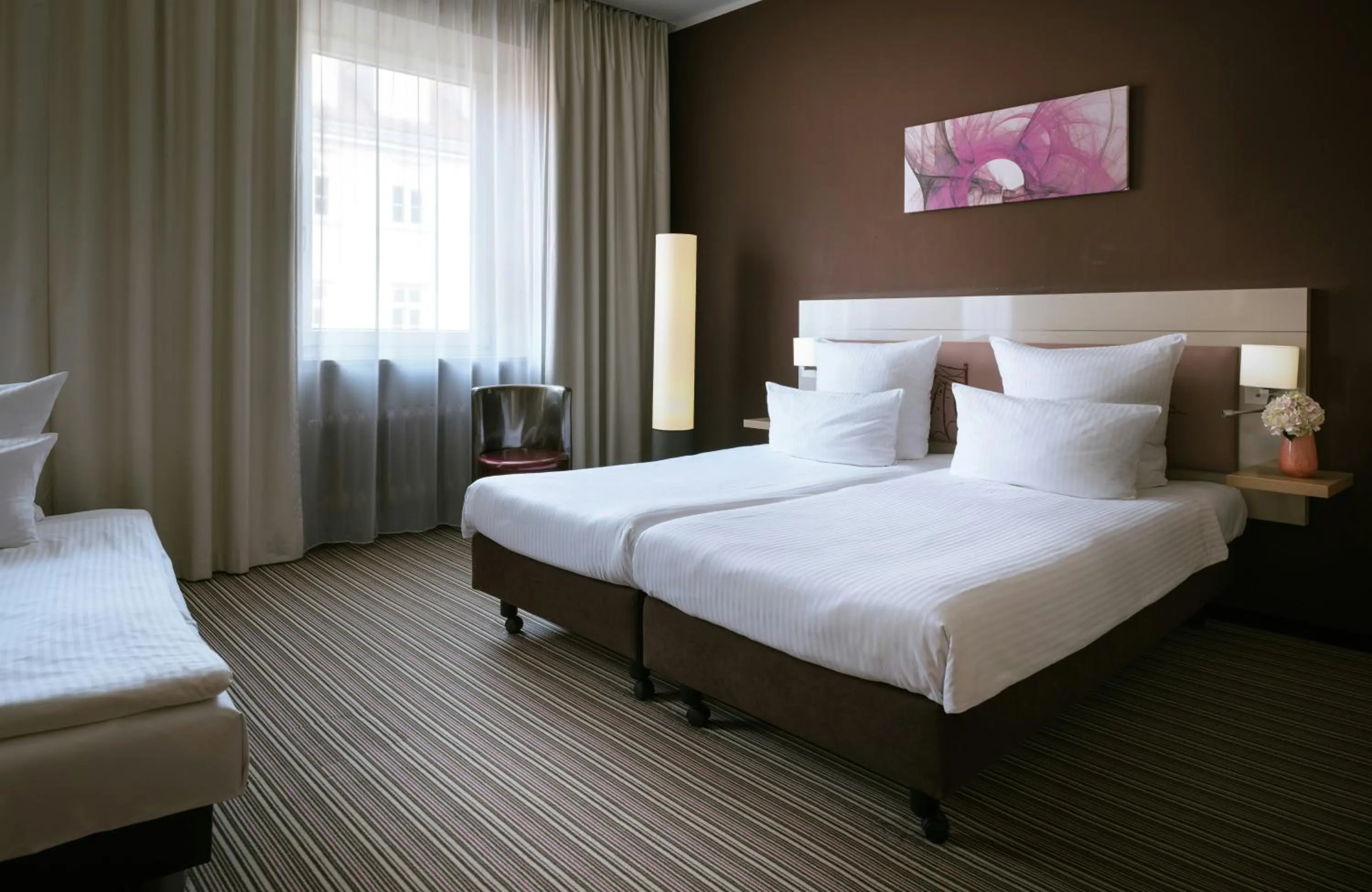 Photo of the whole room, Bed in Leonardo Boutique Hotel Munich