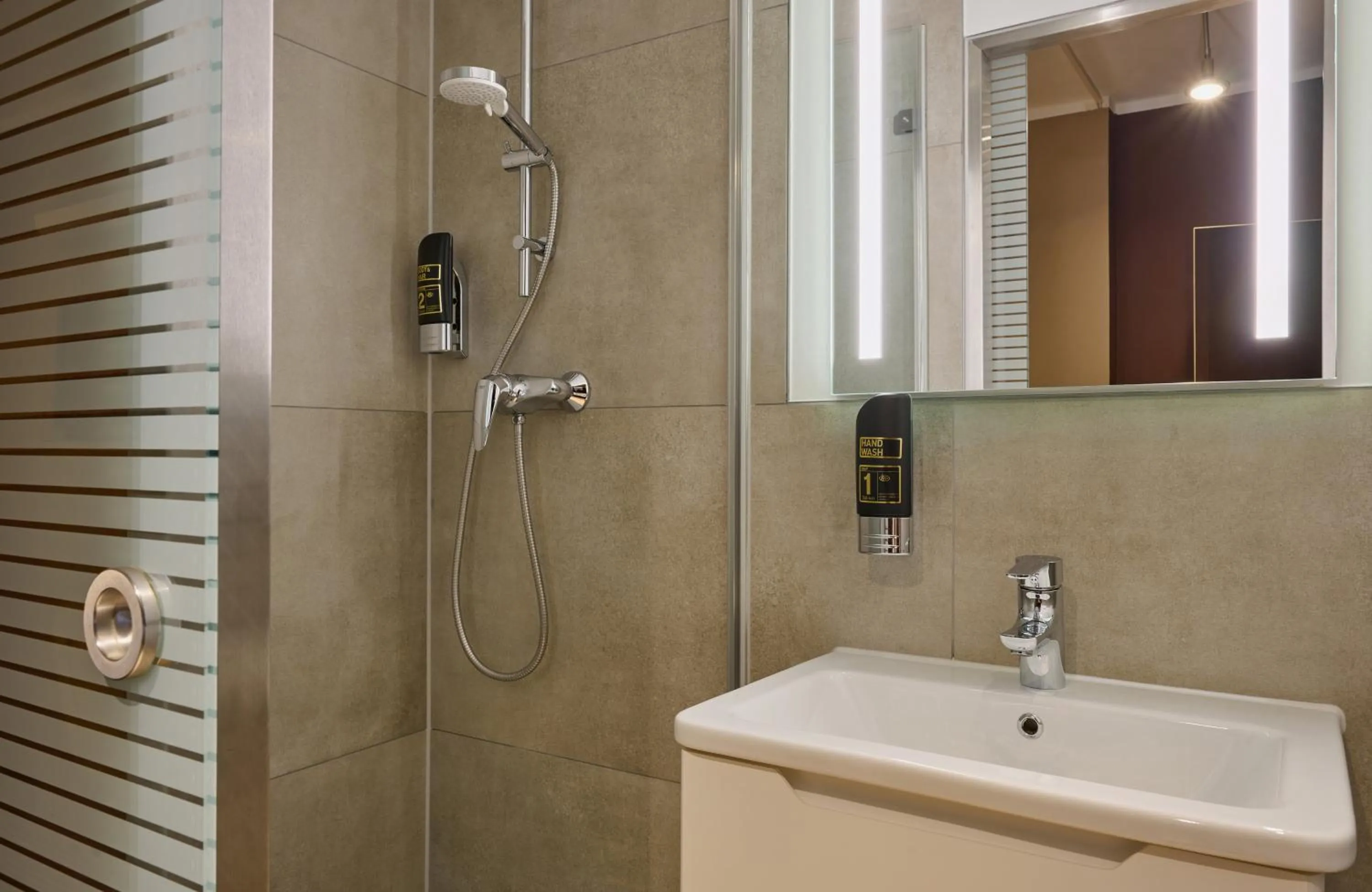 Bathroom in Leonardo Boutique Hotel Munich