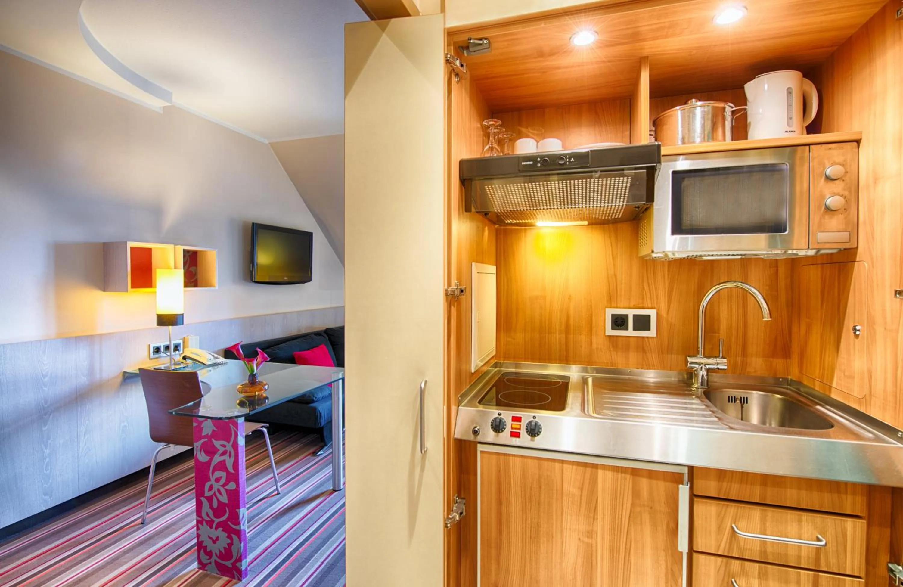 Photo of the whole room in Leonardo Hotel & Residenz München