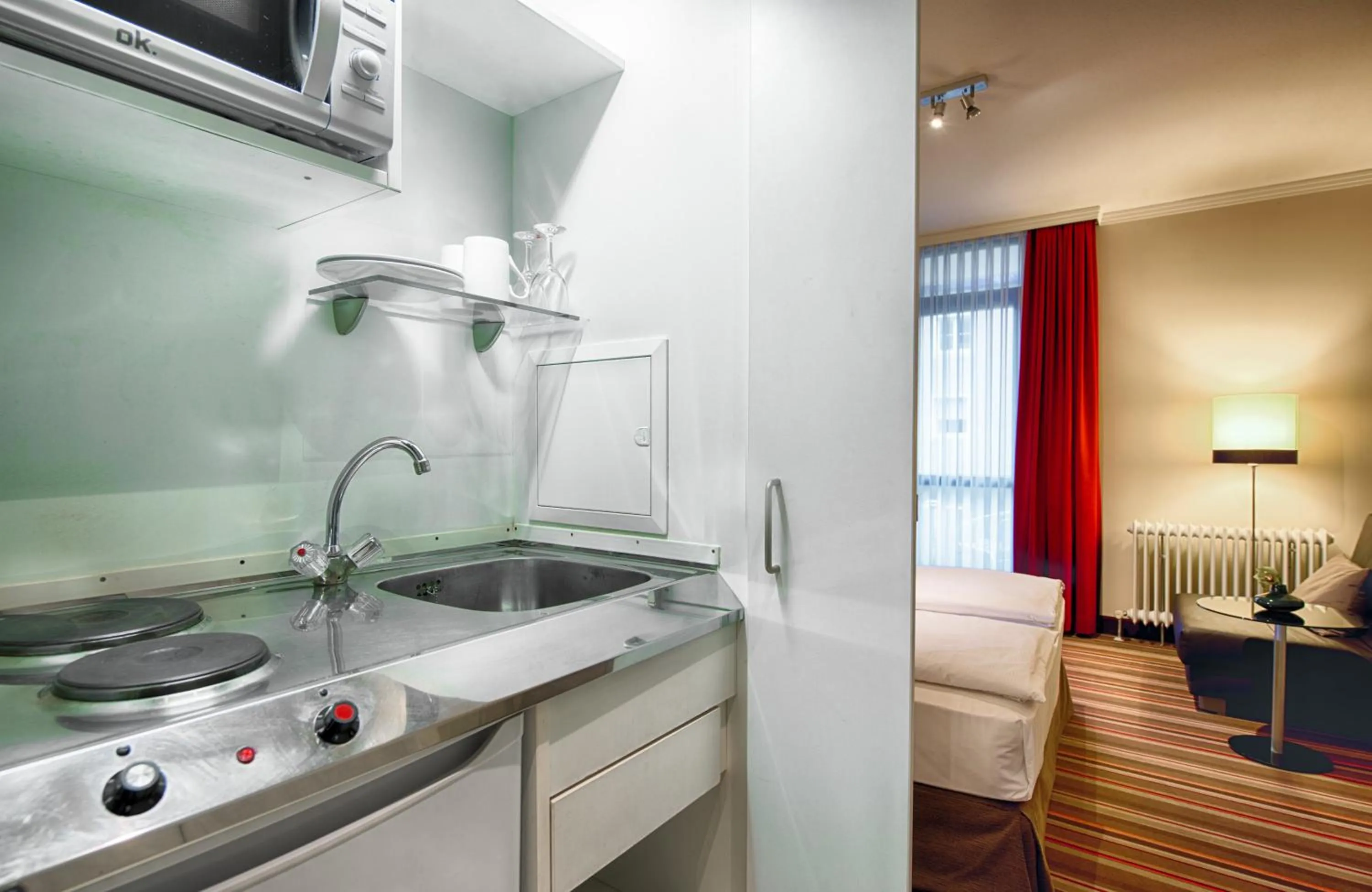 Photo of the whole room in Leonardo Hotel & Residenz München