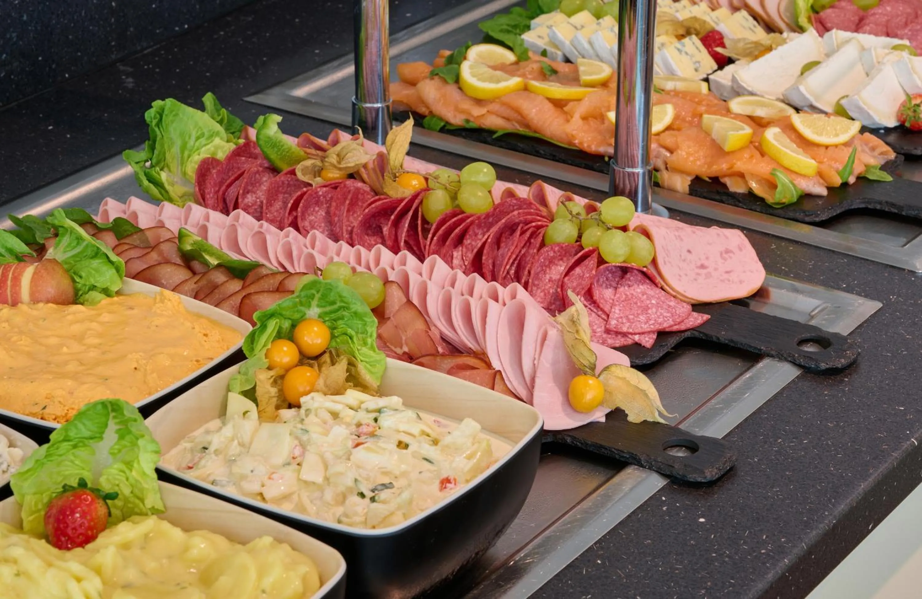 Buffet breakfast in Leonardo Hotel & Residenz München