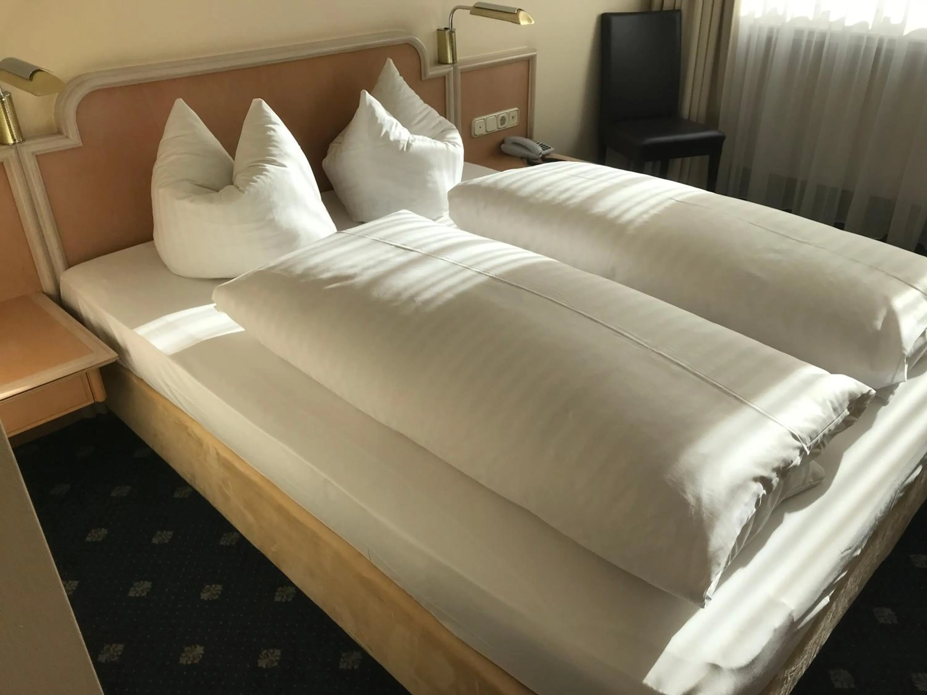 Bed in Hotel Ambiente Garni