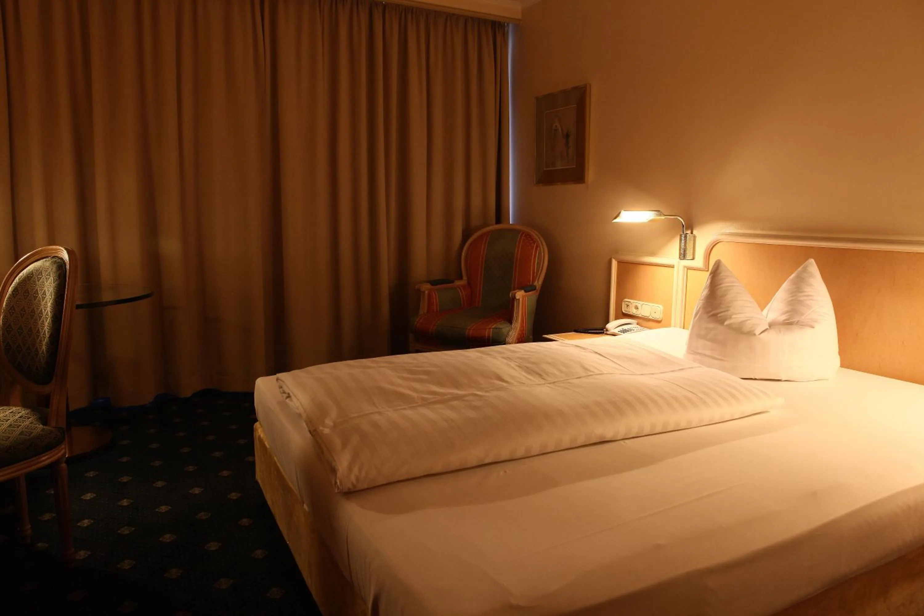 Bed in Hotel Ambiente Garni