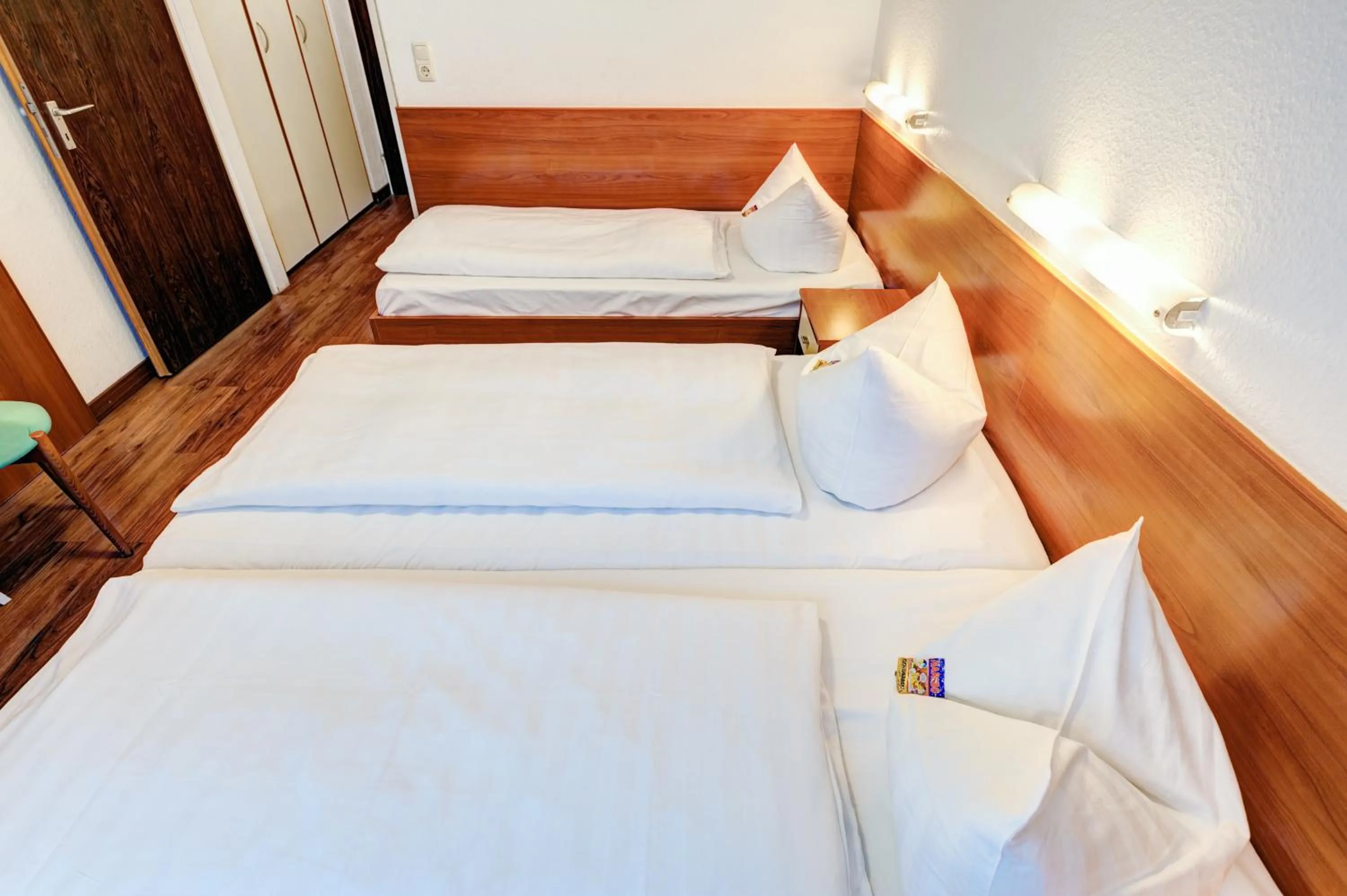 Bed in Hotel Antares München