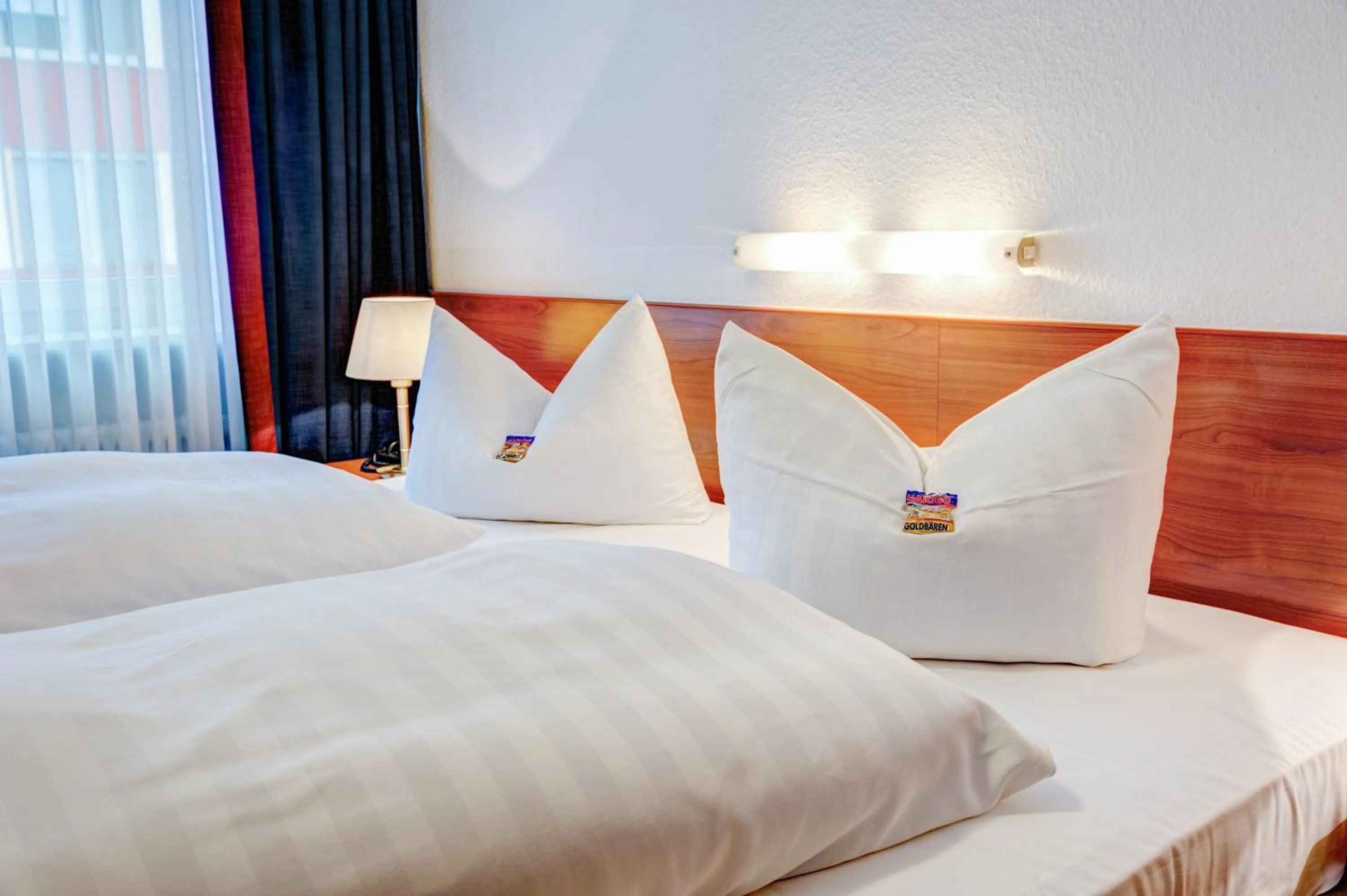 Bed in Hotel Antares München