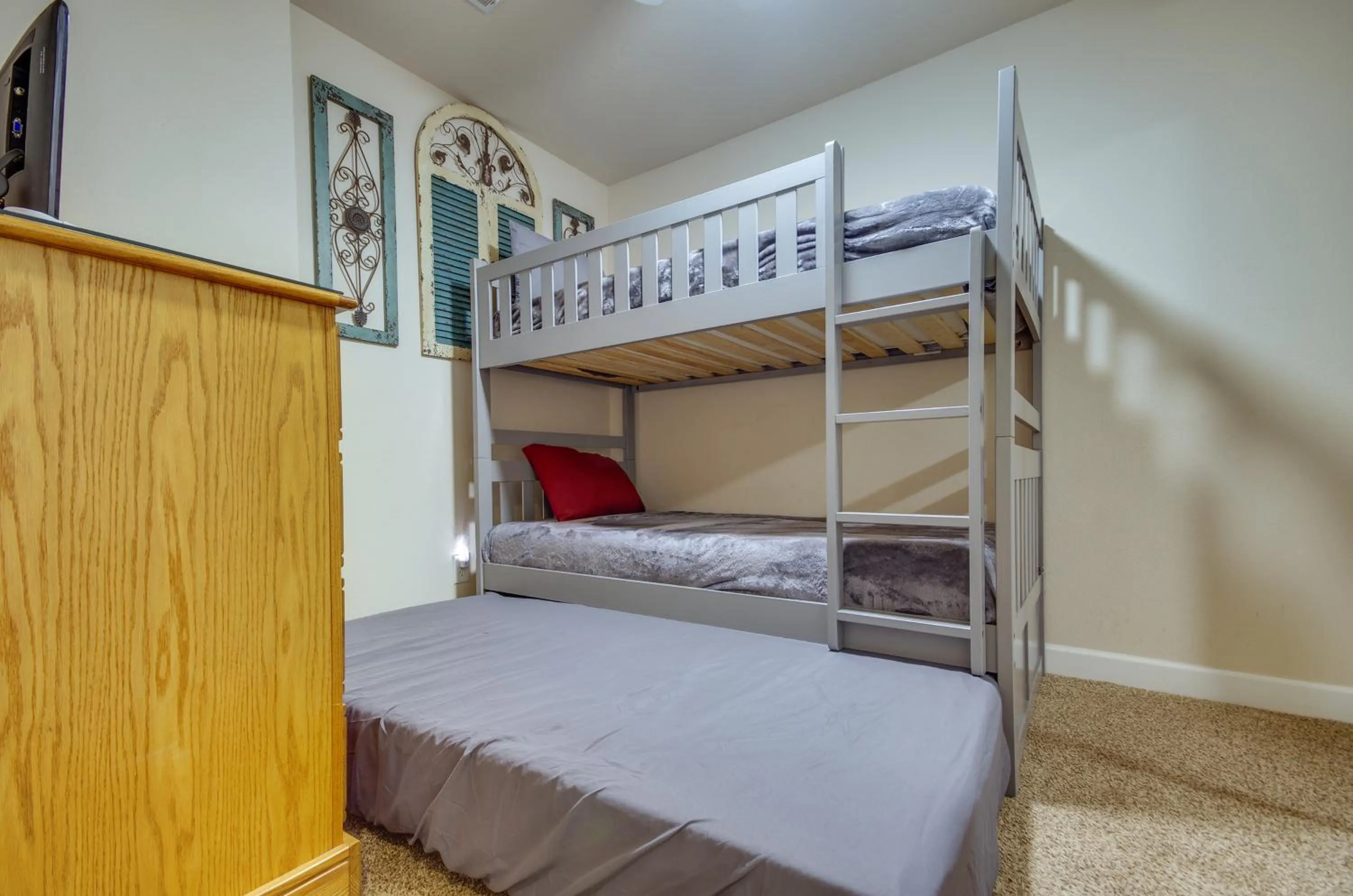 Bed in Lakefront Osage Beach Condo Balcony and Pool Access