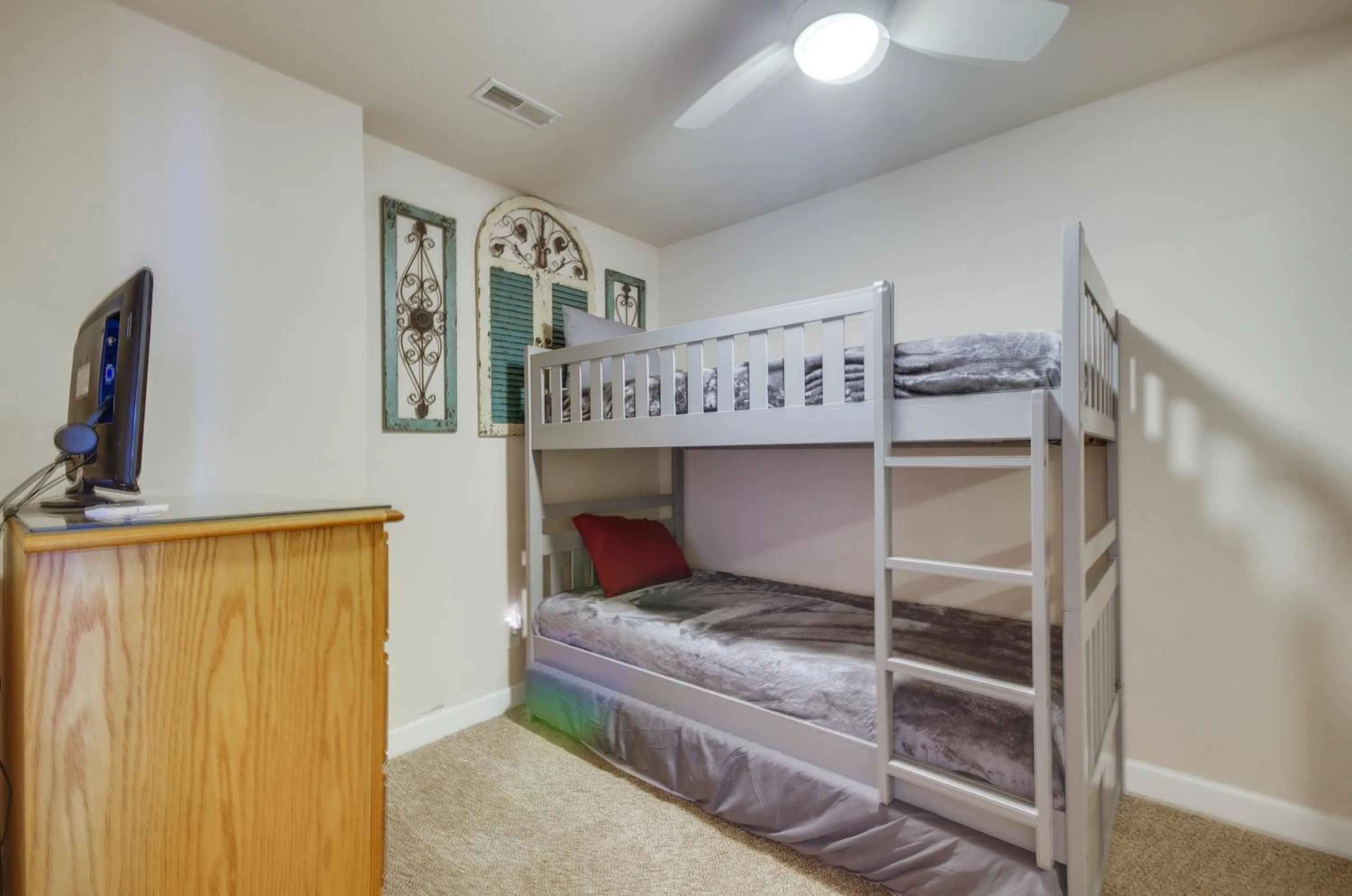 Bed in Lakefront Osage Beach Condo Balcony and Pool Access