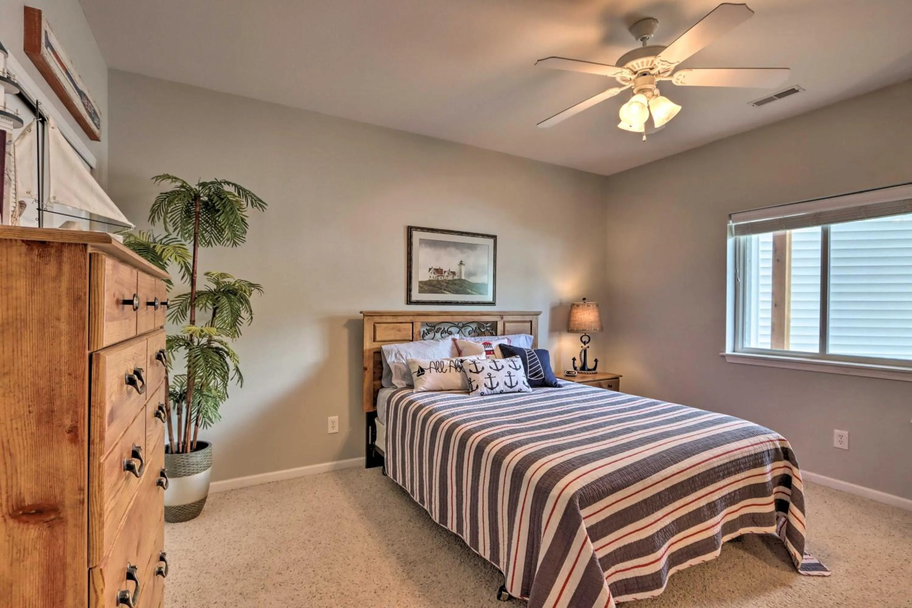 Bed in Lakefront Ozark Condo with Balcony and Seasonal Pool!