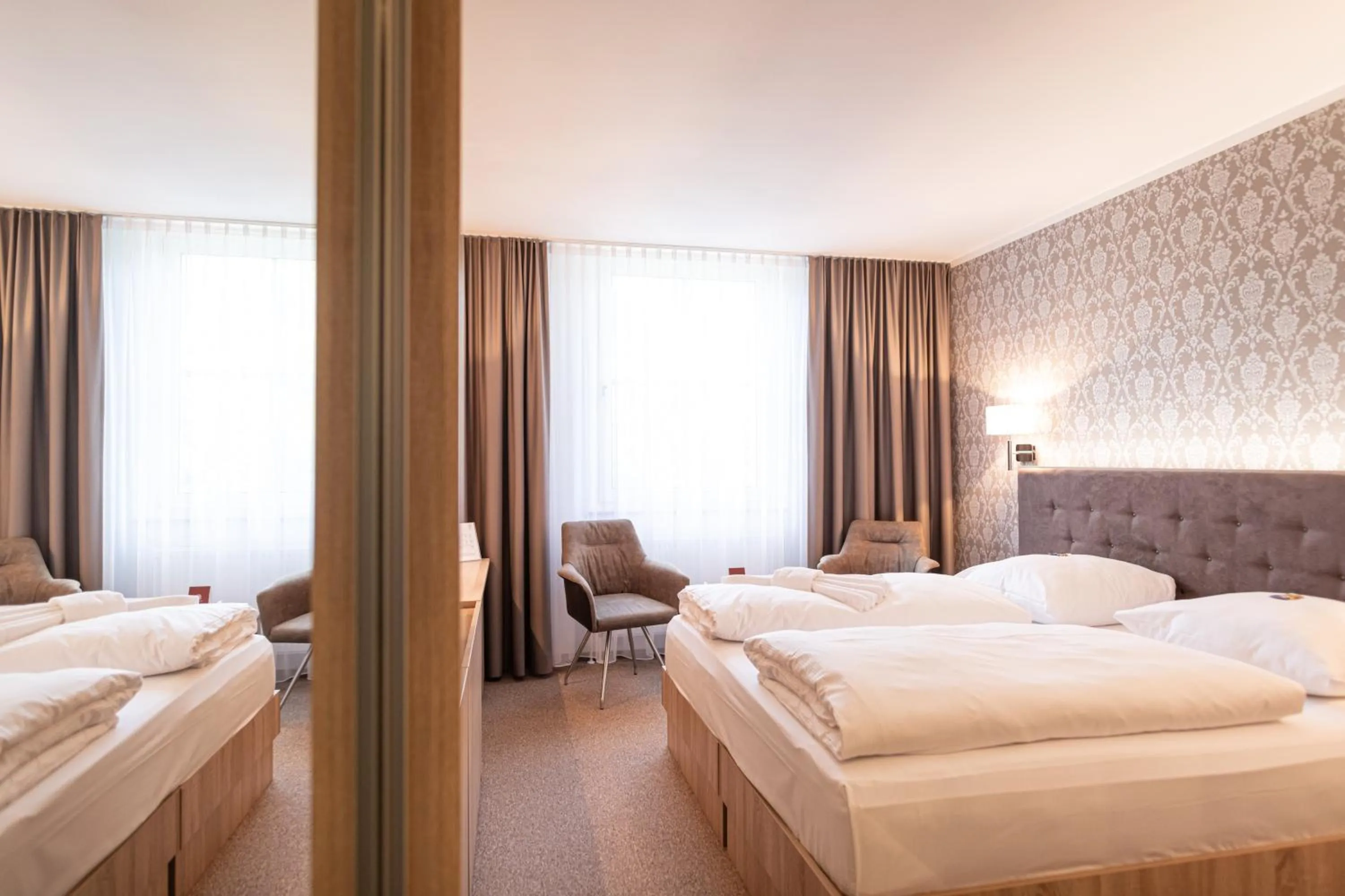 Photo of the whole room, Bed in Schloss Breitenfeld Hotel & Tagung