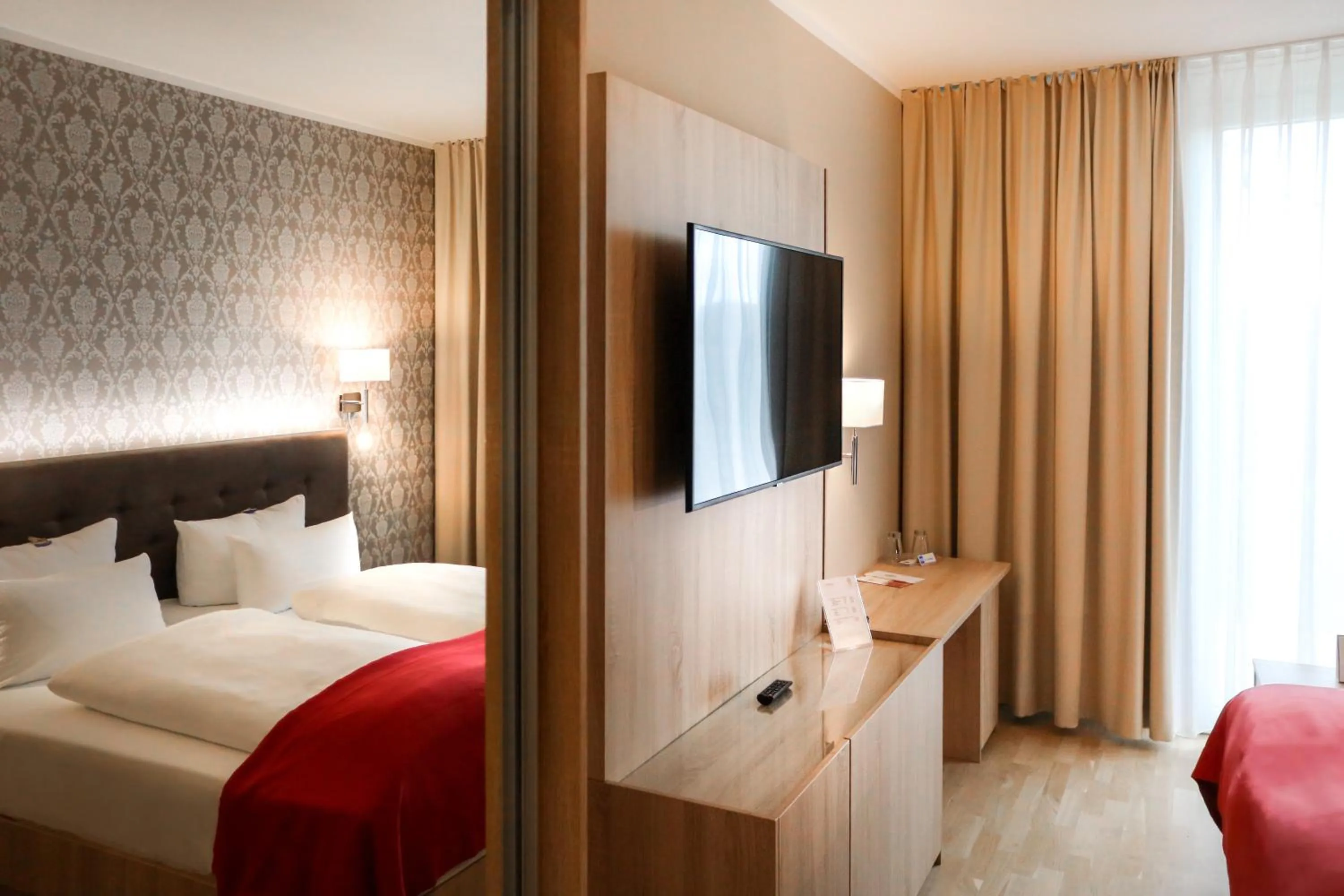 Photo of the whole room, Bed in Schloss Breitenfeld Hotel & Tagung