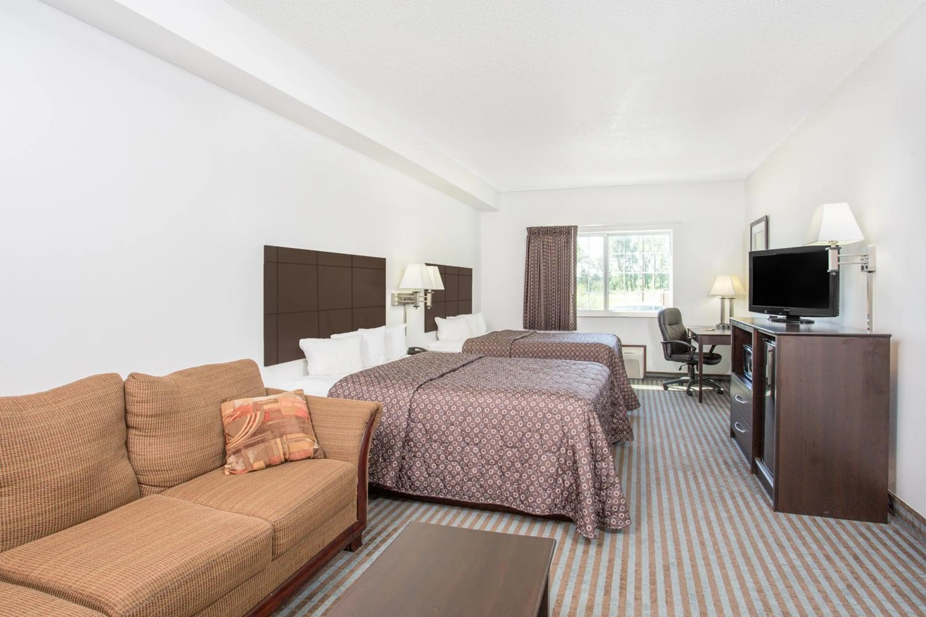 Bed in Super 8 by Wyndham Cedar Falls