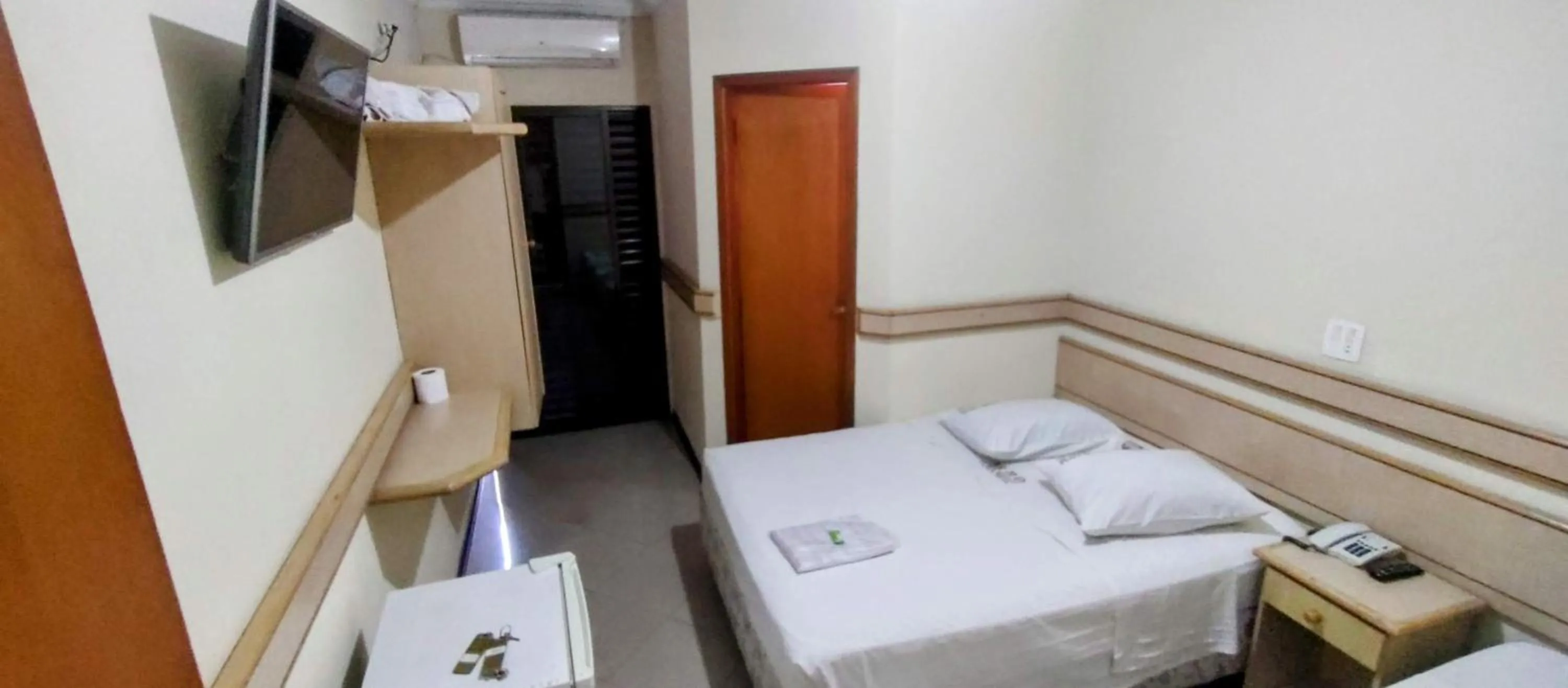 Bed in Aero Plaza Hotel