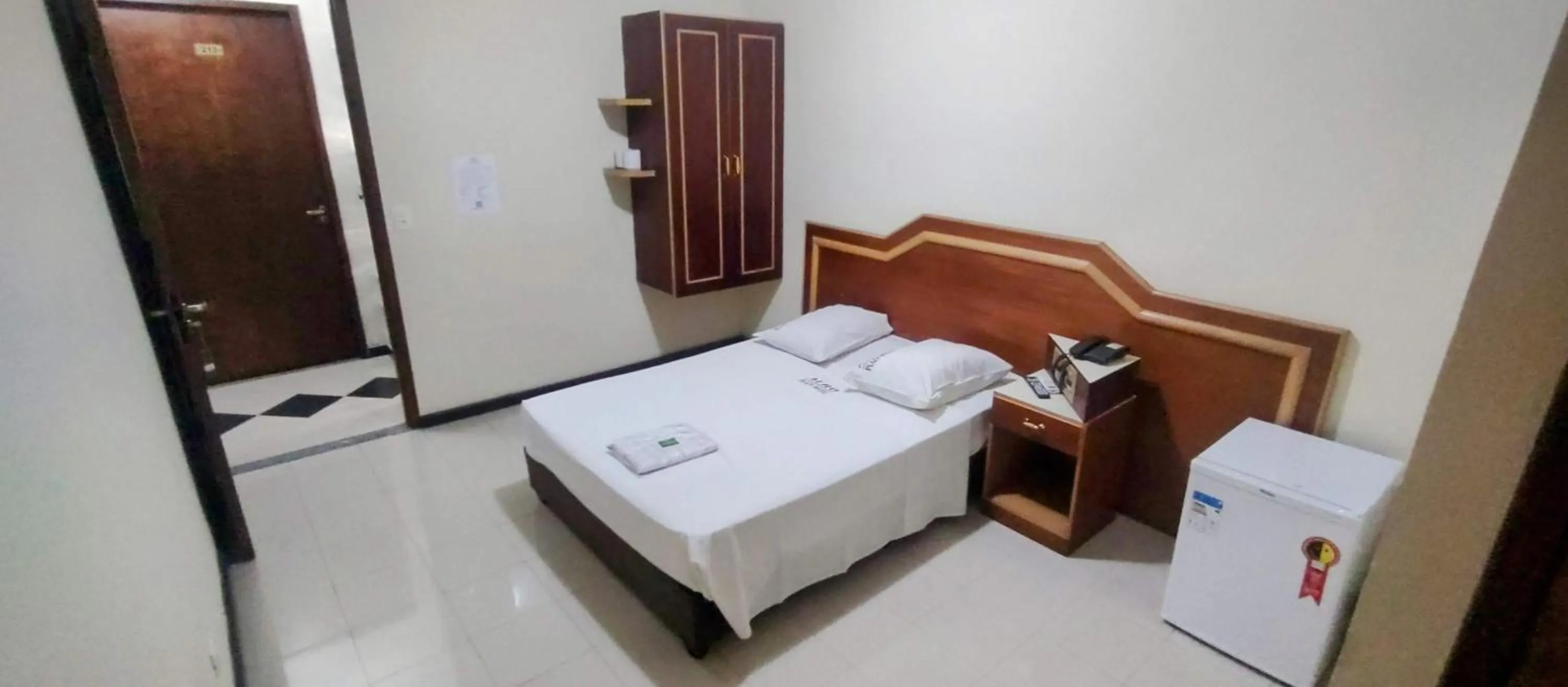 Bed in Aero Plaza Hotel