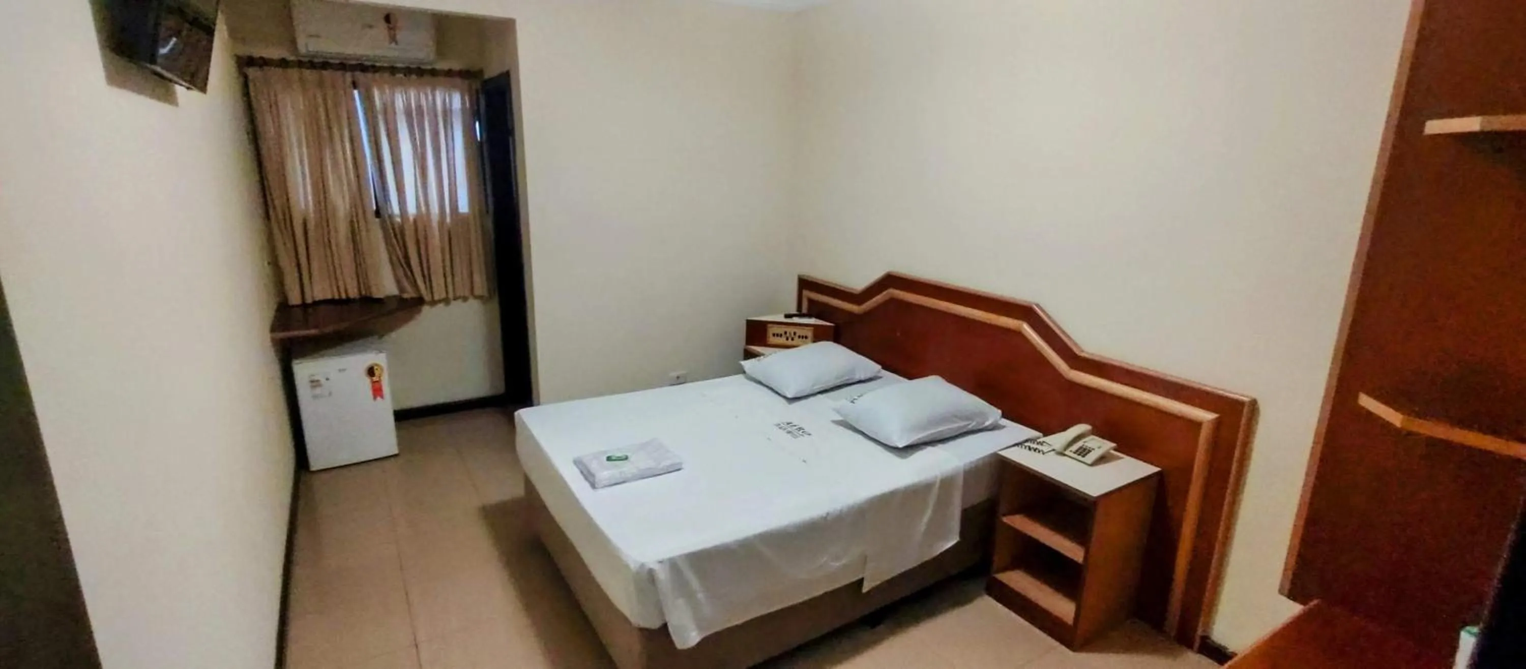 Bed in Aero Plaza Hotel