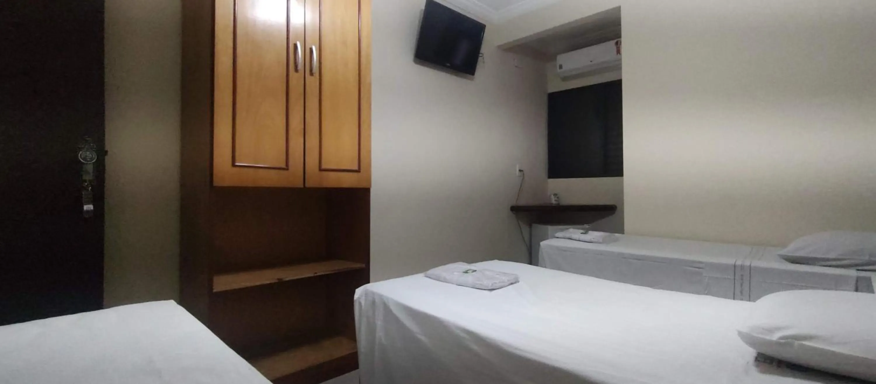 Bed in Aero Plaza Hotel