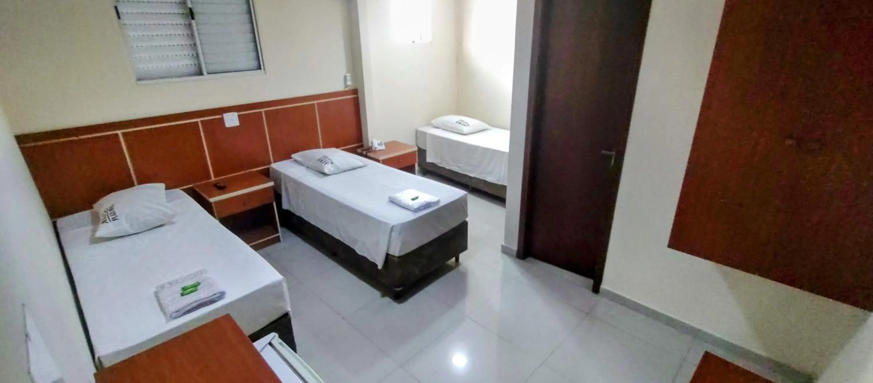 Bed in Aero Plaza Hotel