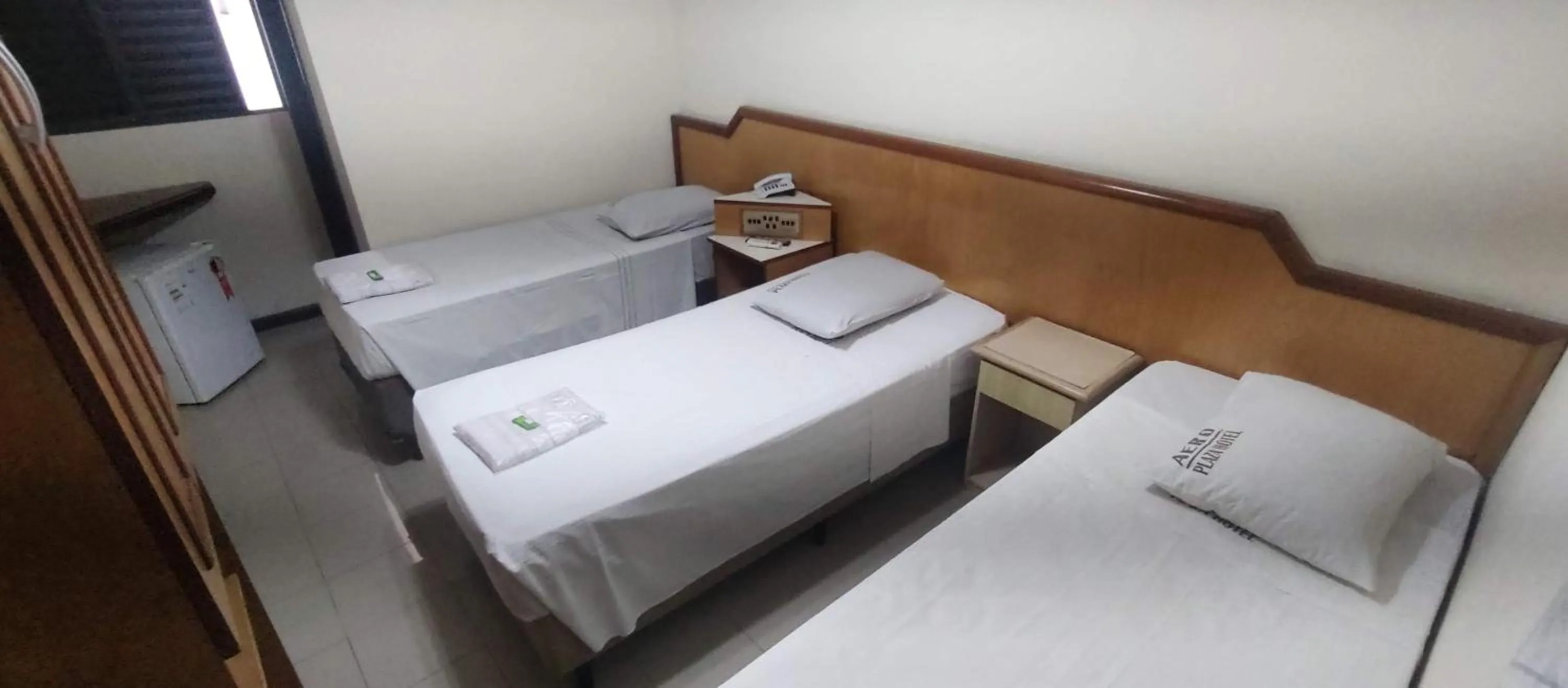 Bed in Aero Plaza Hotel
