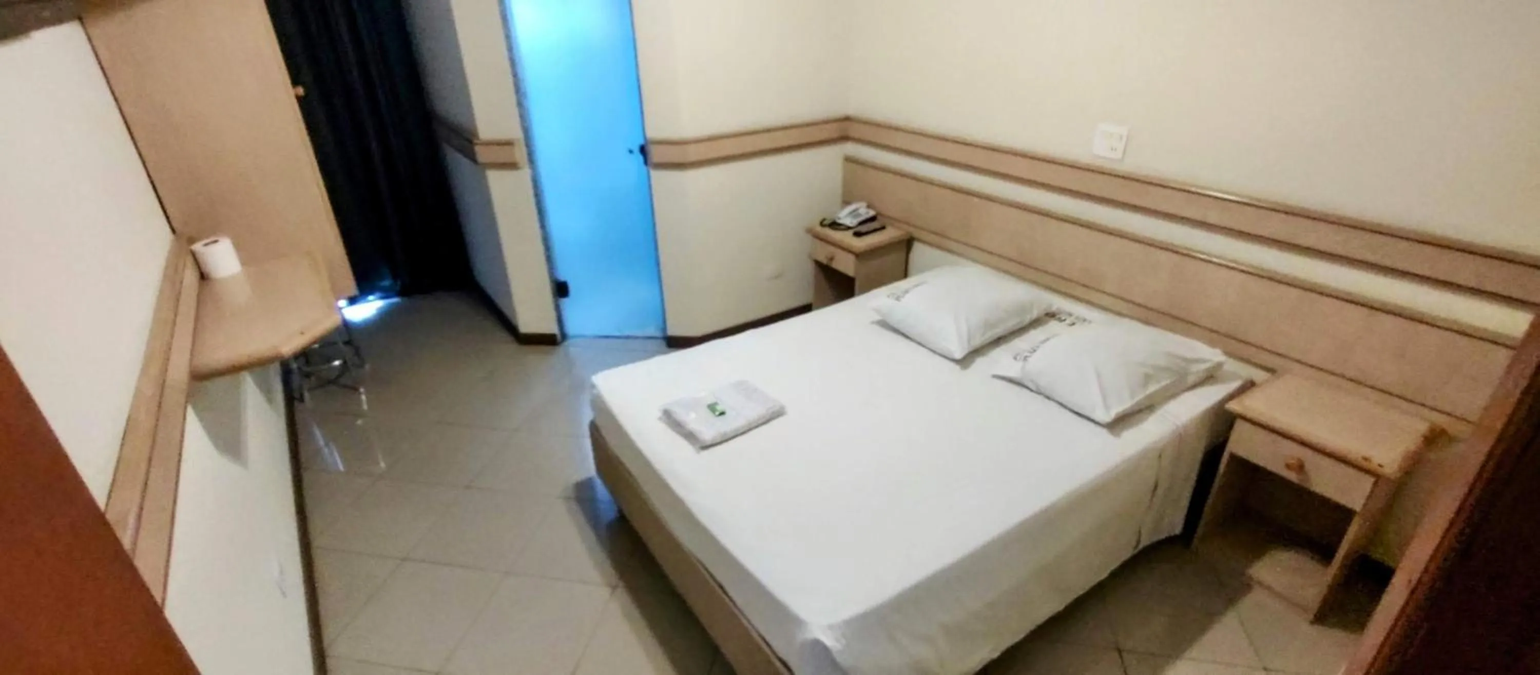 Bed in Aero Plaza Hotel