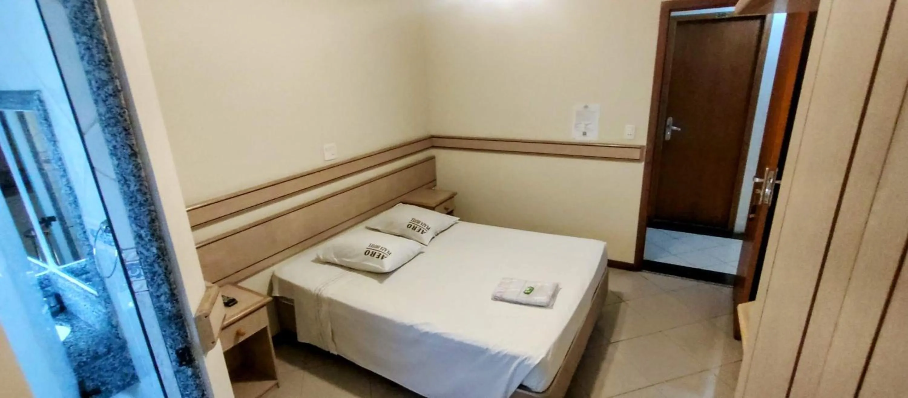 Bed in Aero Plaza Hotel