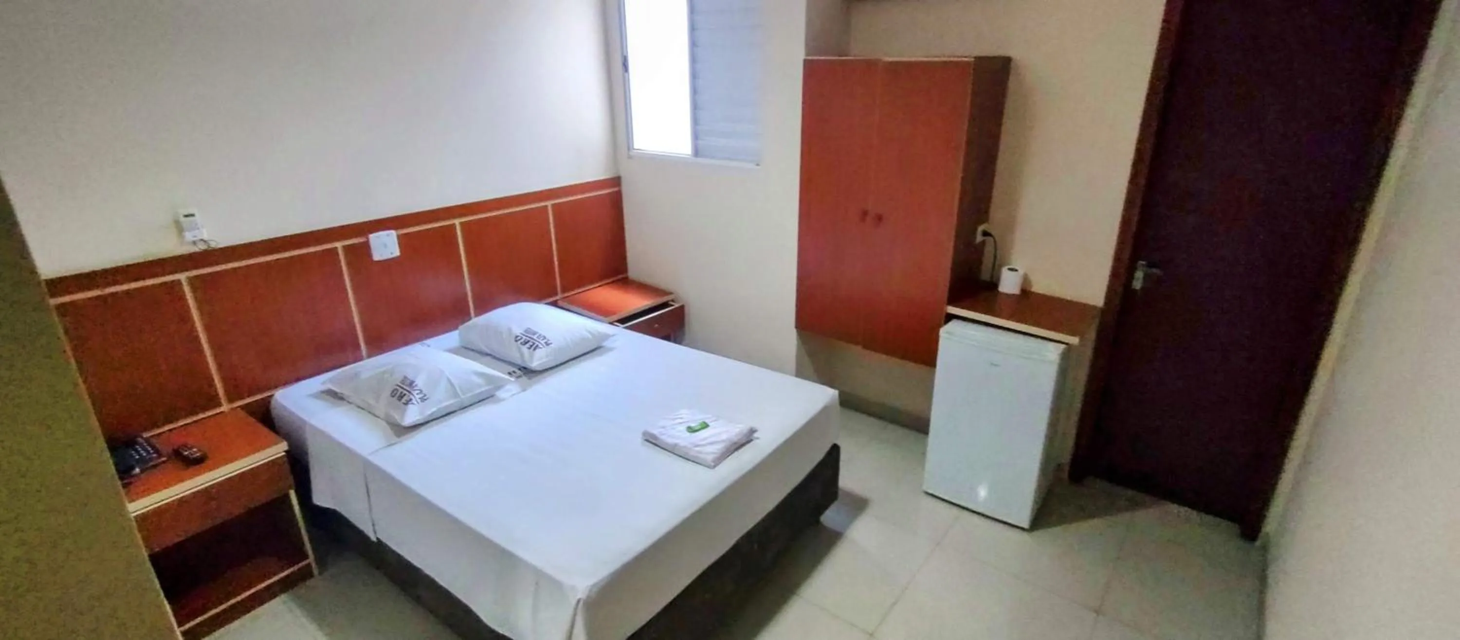 Bed in Aero Plaza Hotel