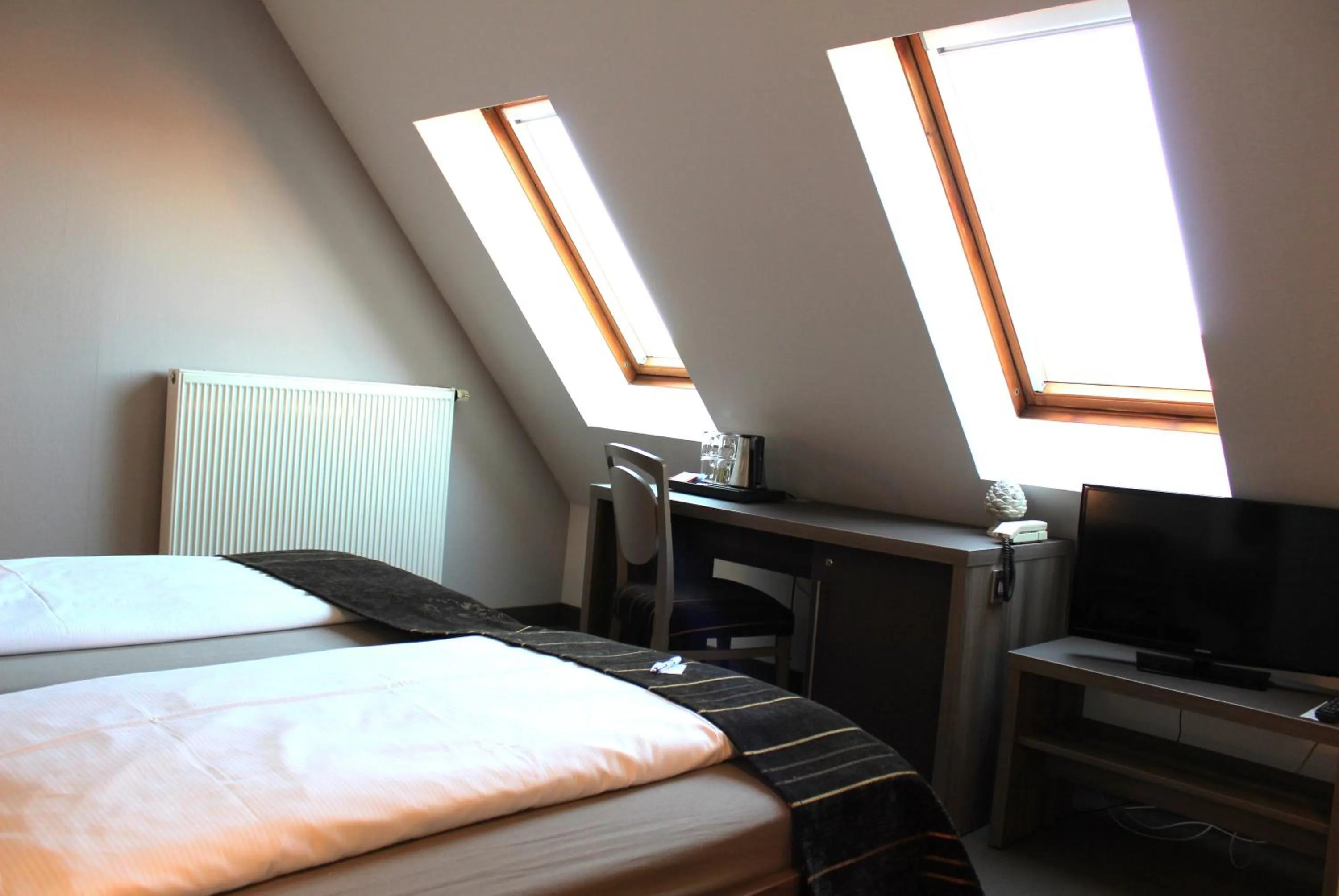 Photo of the whole room, Bed in Konsumhotel Dorotheenhof Weimar