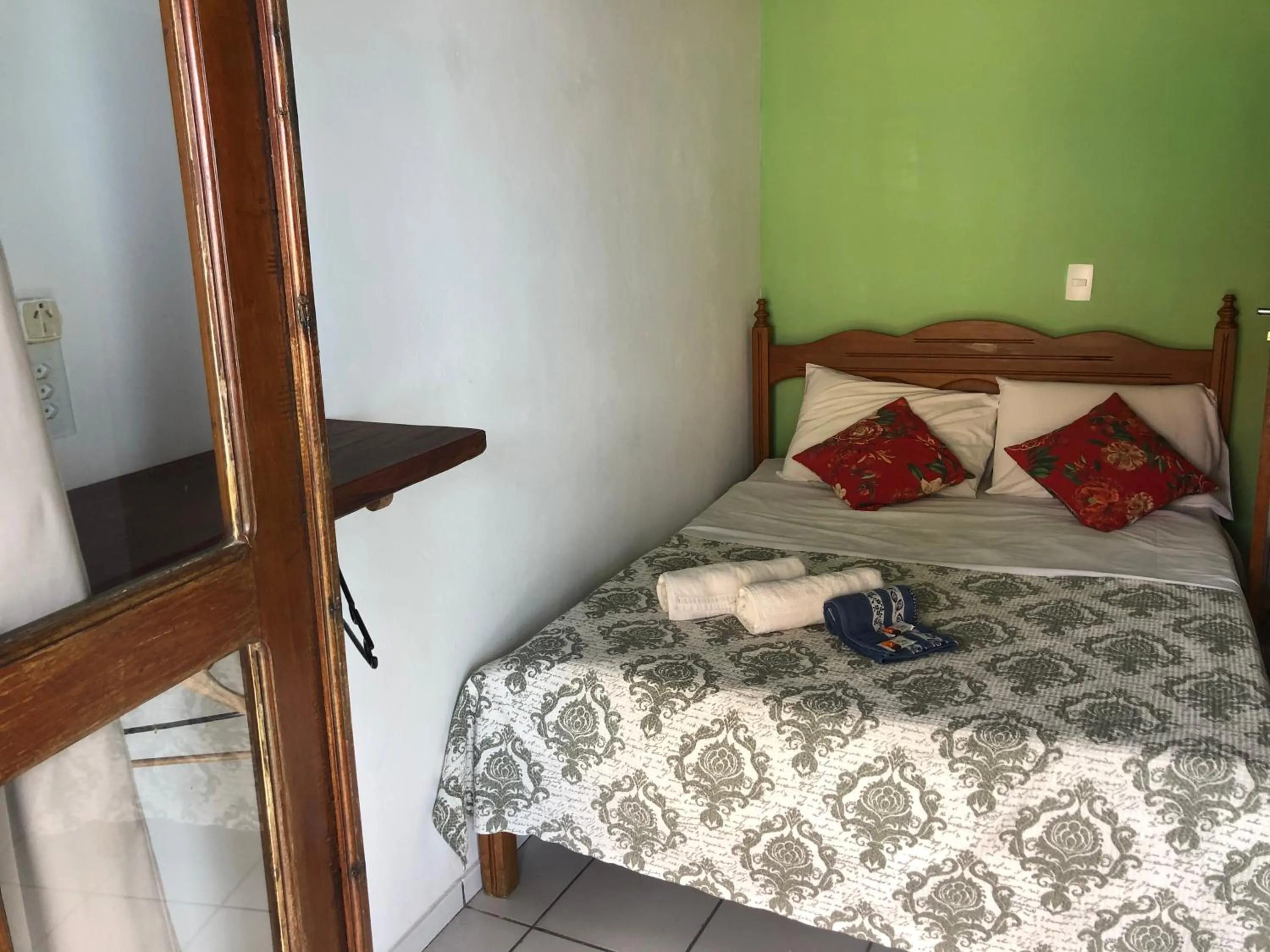 Bed in Pousada Tranquila