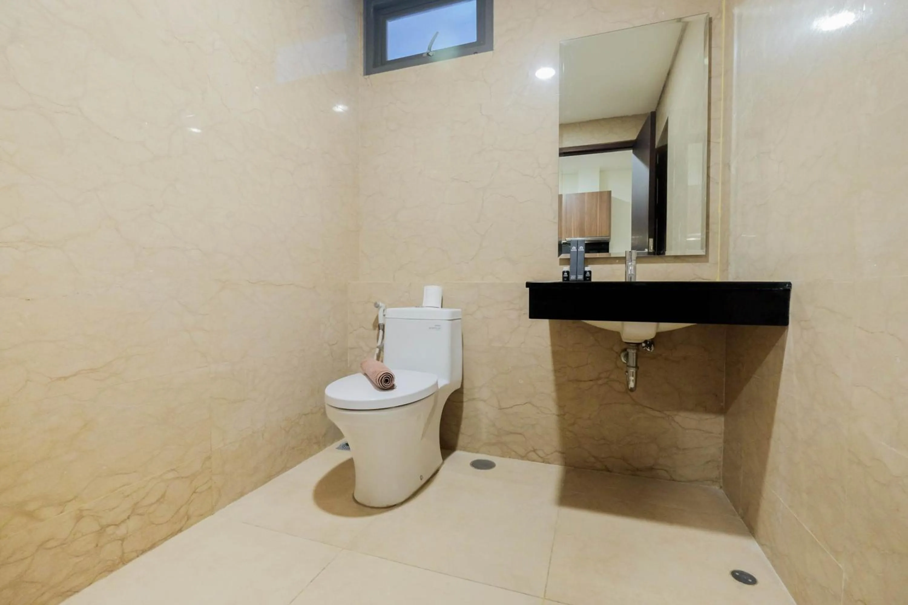 Bathroom in 1BR Pancoran L'Avenue Comfy Apartment By Travelio