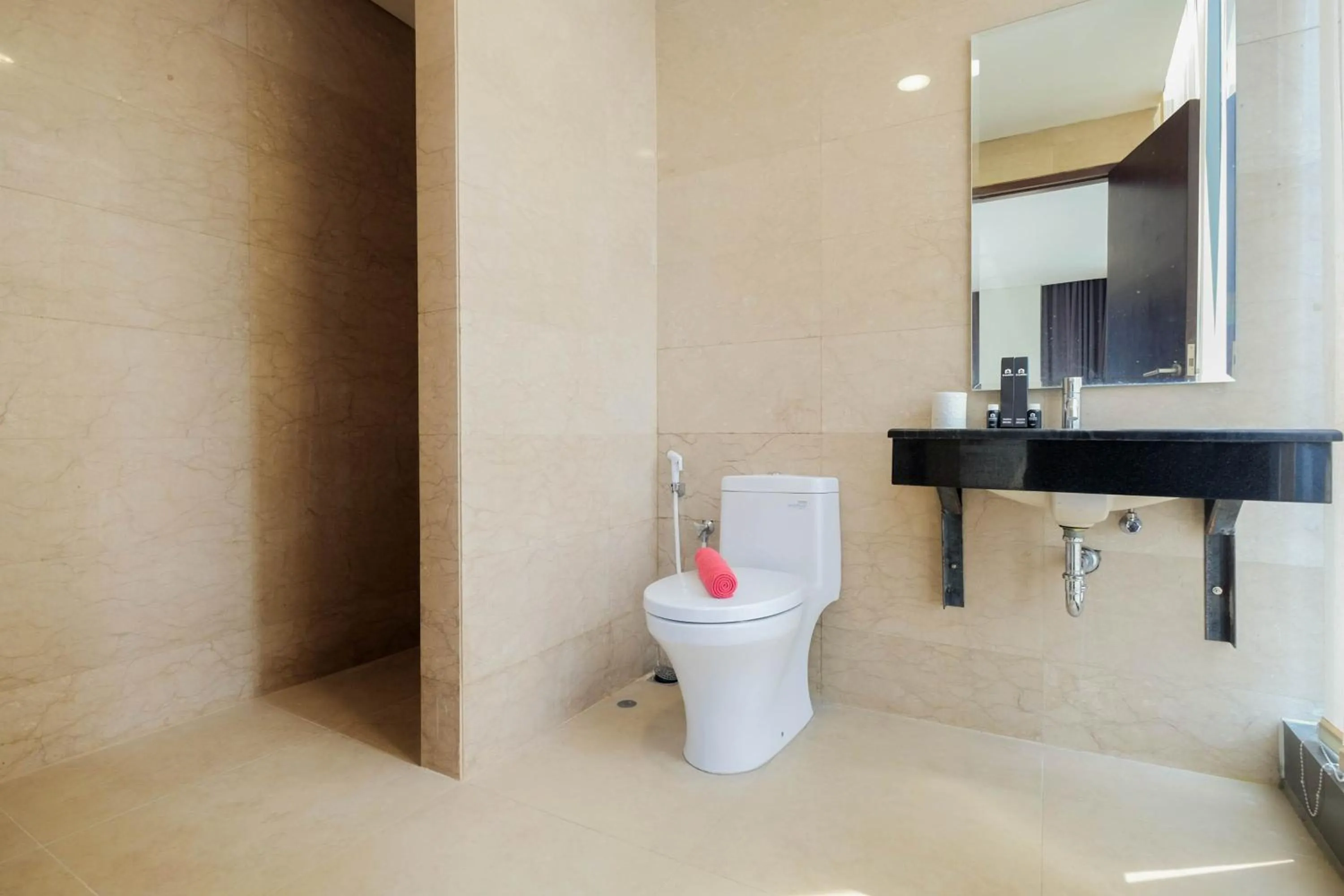 Bathroom in Comfy 3BR at L'Avenue Apartment Pancoran By Travelio