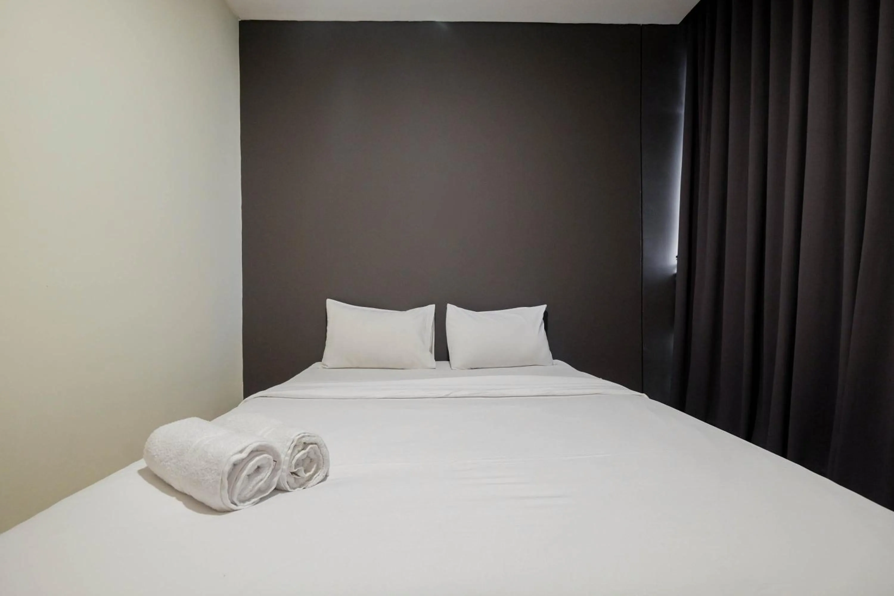 Bed in Comfy 3BR at L'Avenue Apartment Pancoran By Travelio