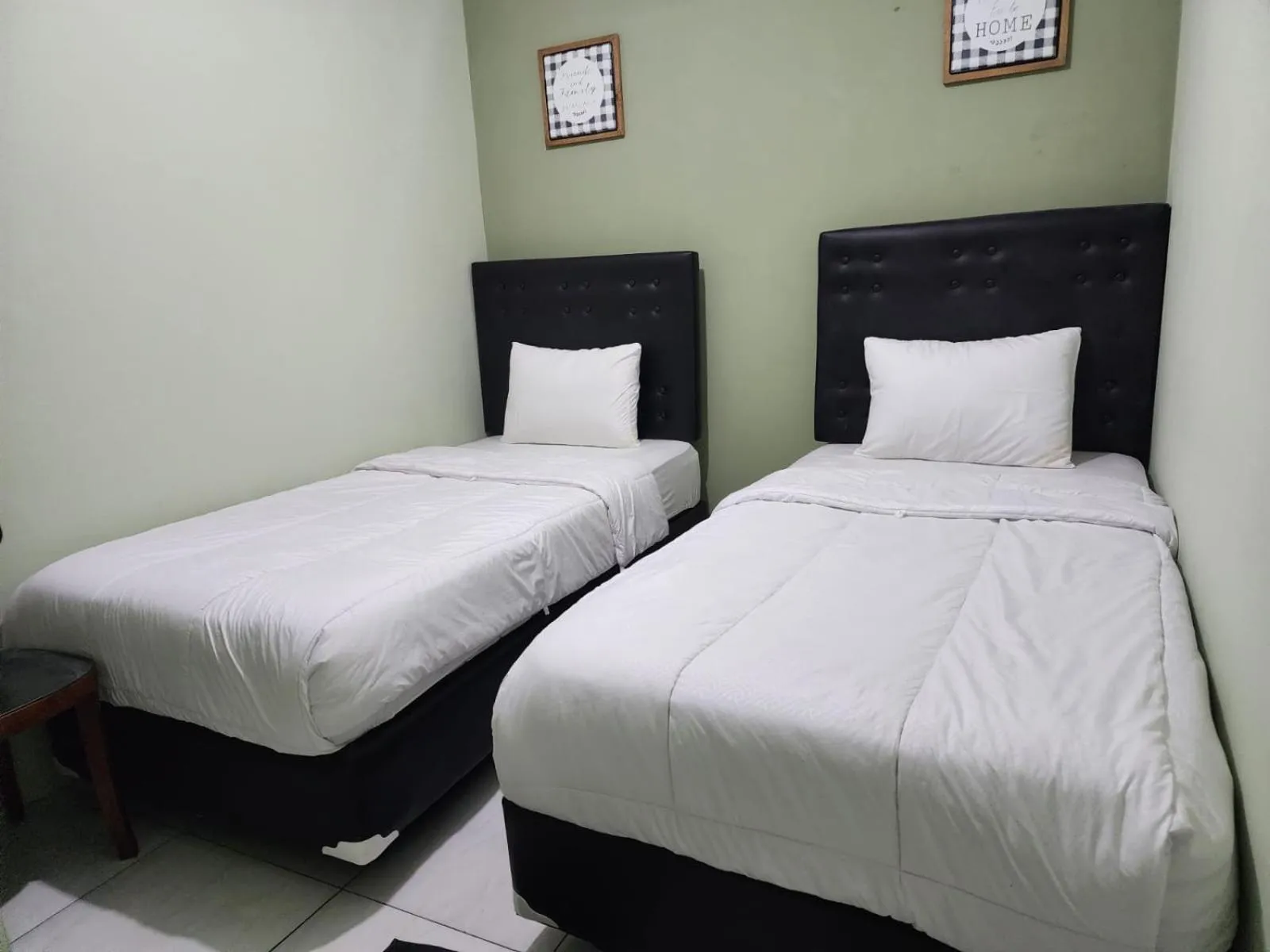 Bed in Omah Pandhoek Family Syariah by Stayku