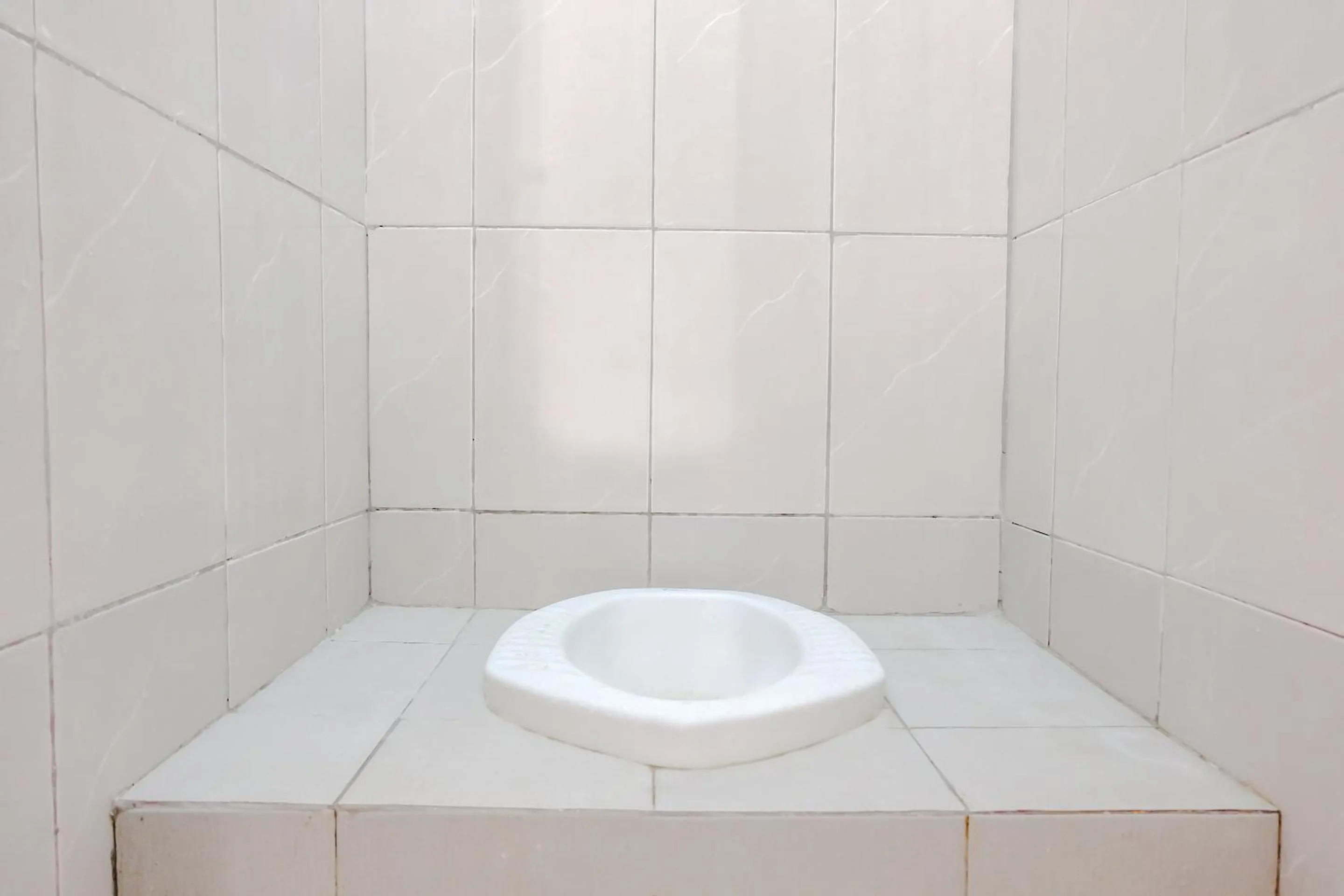 Bathroom in Omah Pandhoek Family Syariah by Stayku