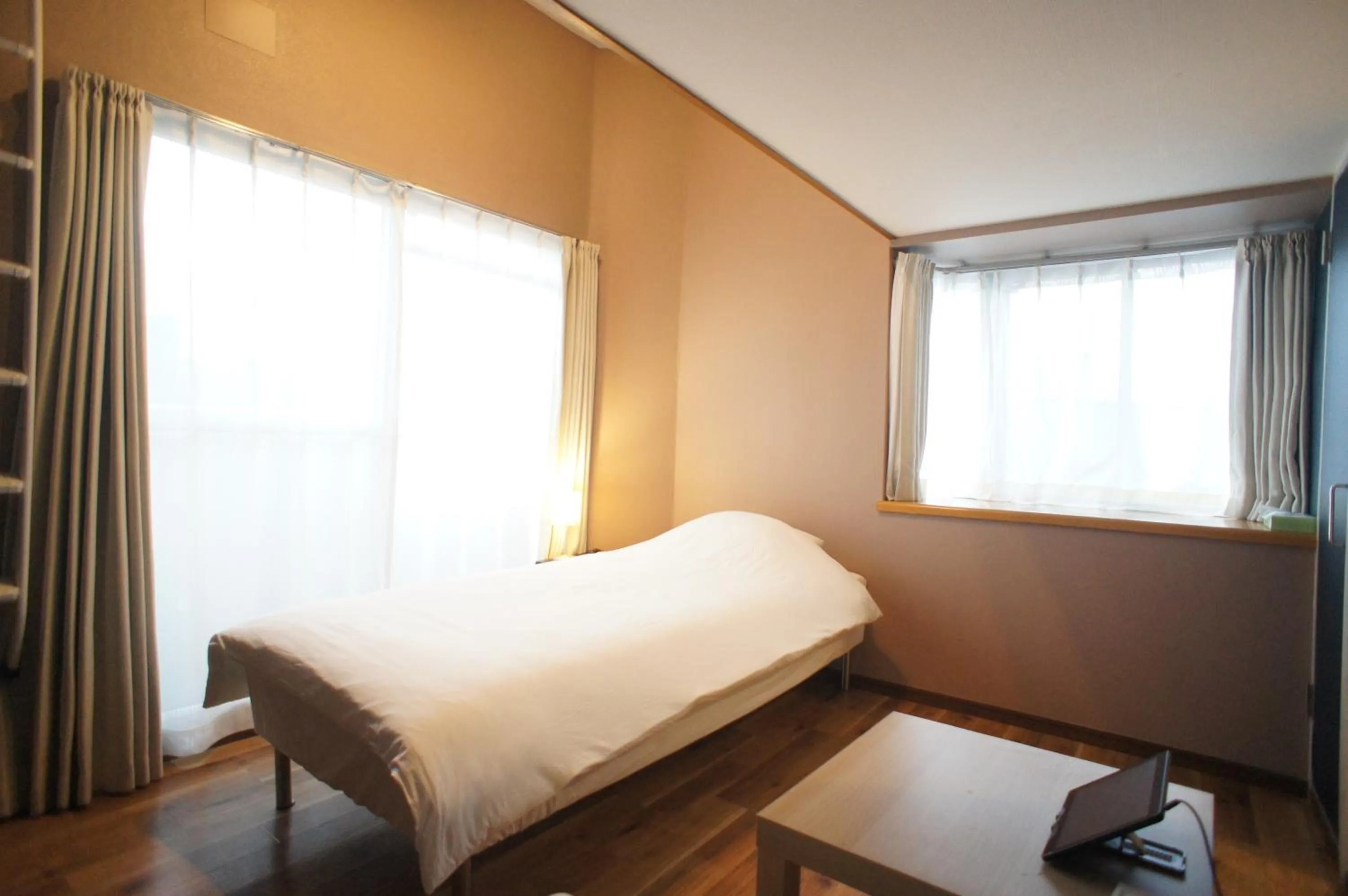 Bed in Plusone Nishikoen