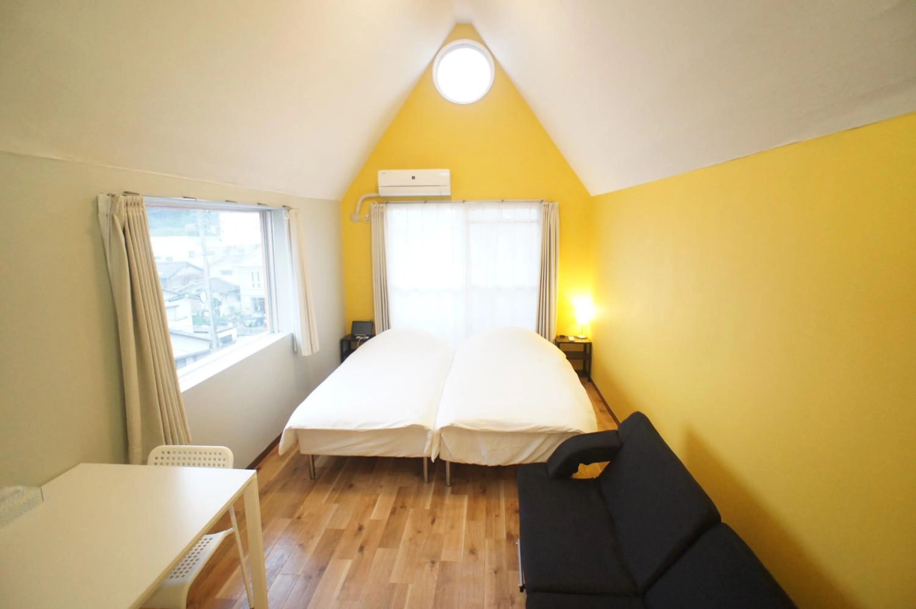 Bed in Plusone Nishikoen