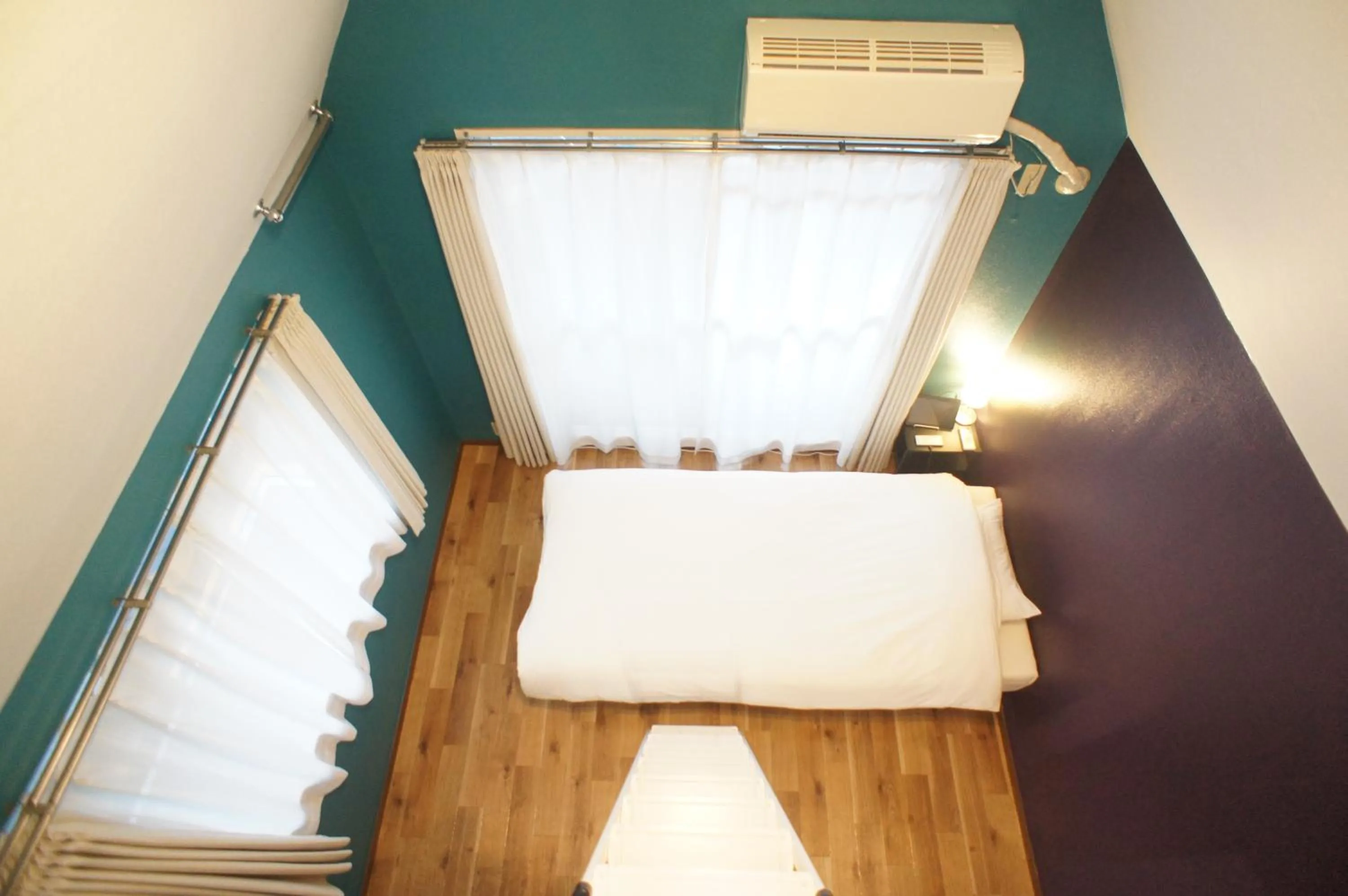 Bed in Plusone Nishikoen