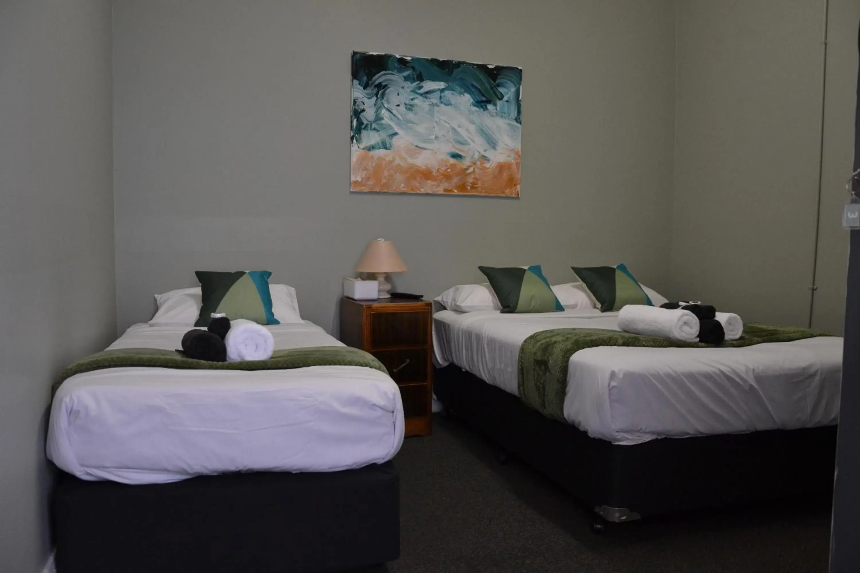 Triple Room with Shared Bathroom in Black Diamond Lodge Triple Room with Shared Bathroom in Black Diamond Lodge
