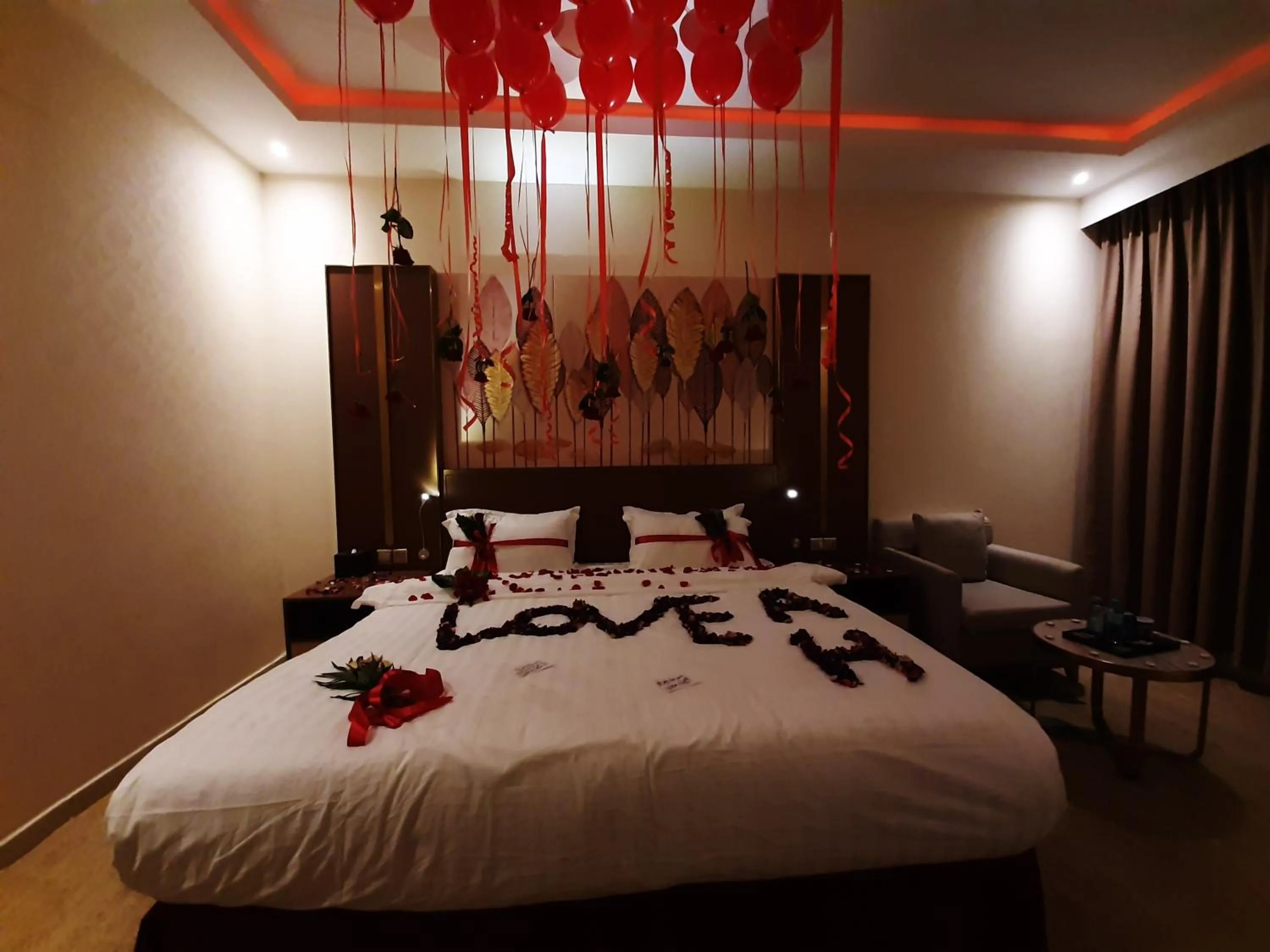 Bed in Qasr Alshamal Hotel