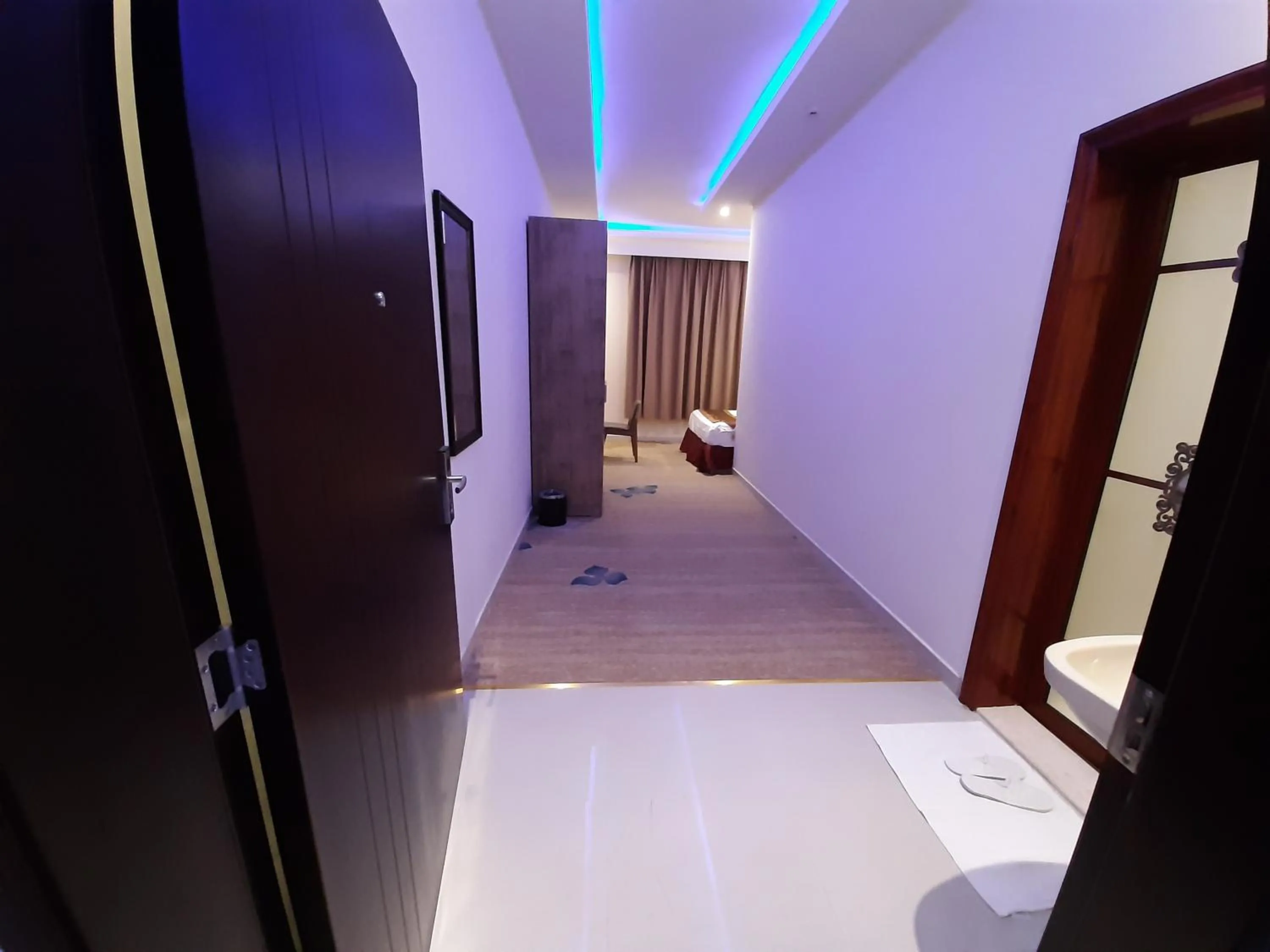 Bed in Qasr Alshamal Hotel