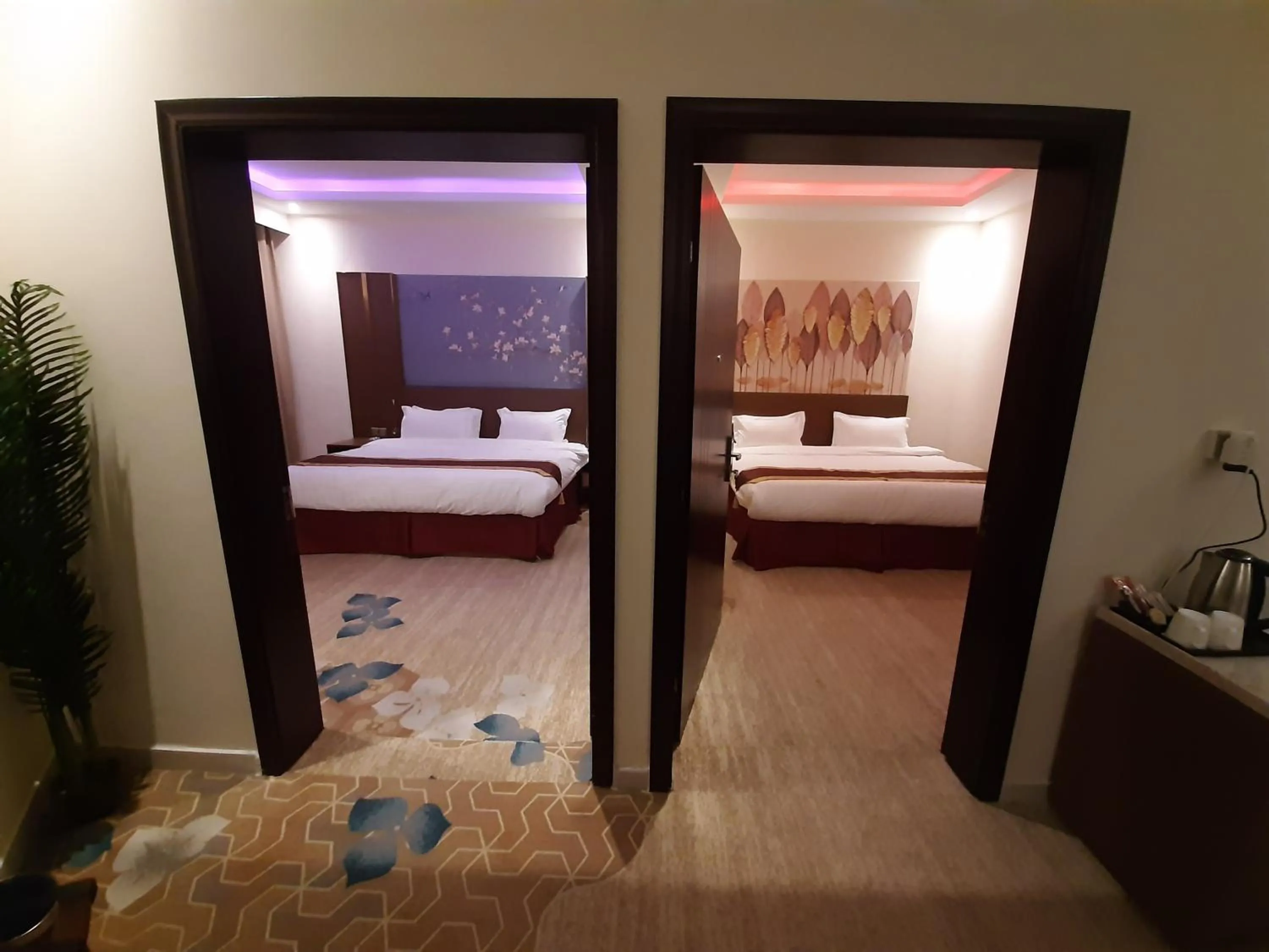 Bed in Qasr Alshamal Hotel