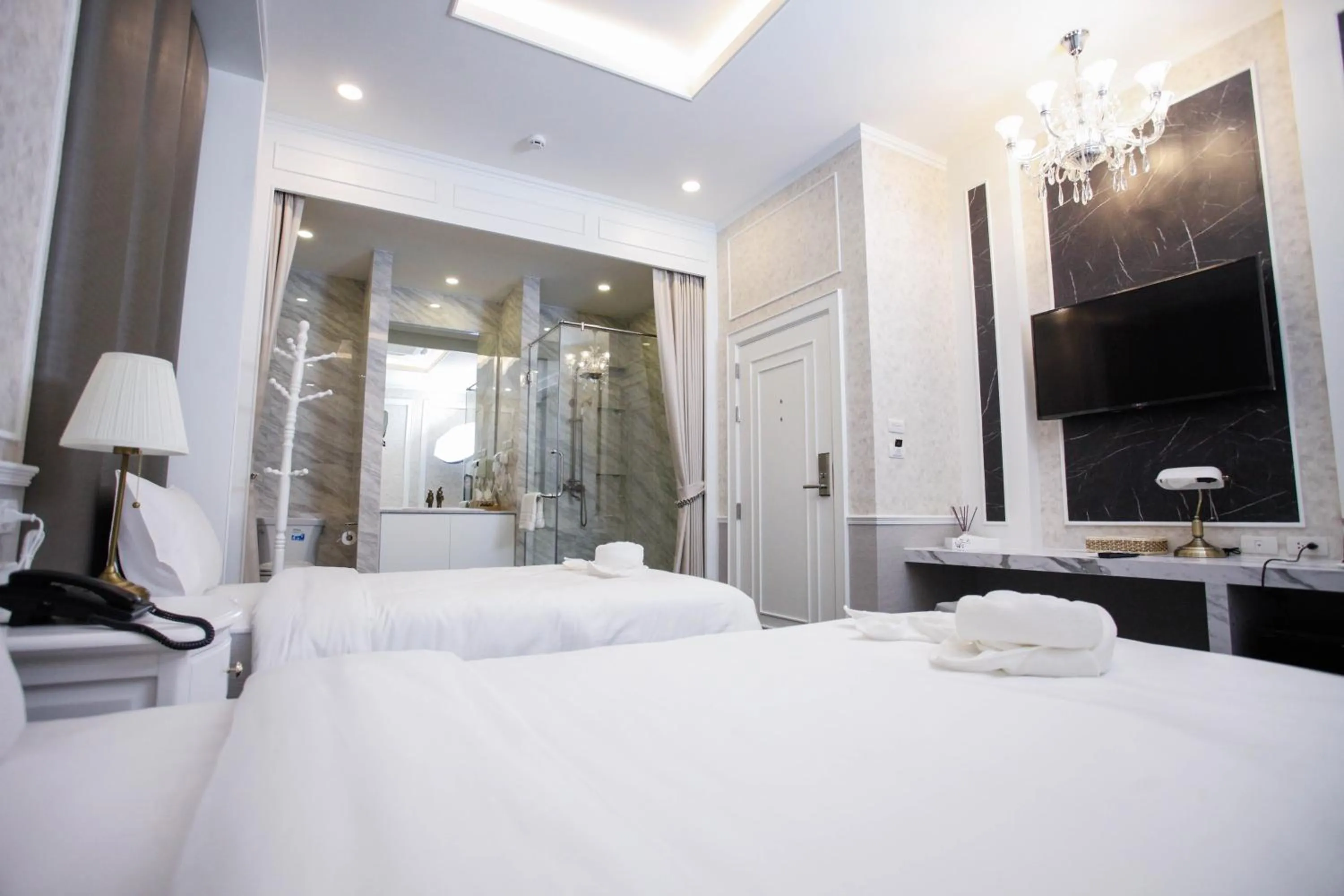 Photo of the whole room, Bed in VARIMANTRA HOTEL