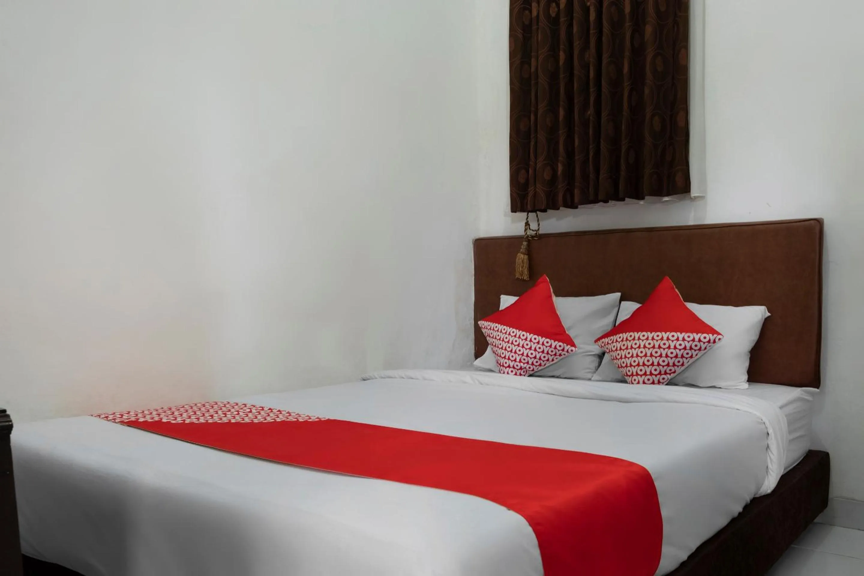 Bedroom in Hotel O Lumungga Residence Syariah