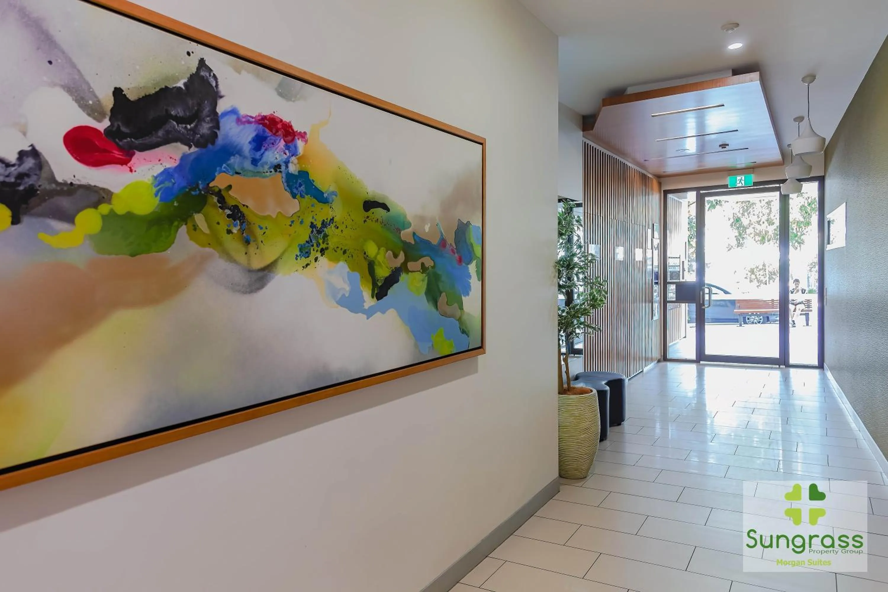 Property logo or sign in Morgan Suites