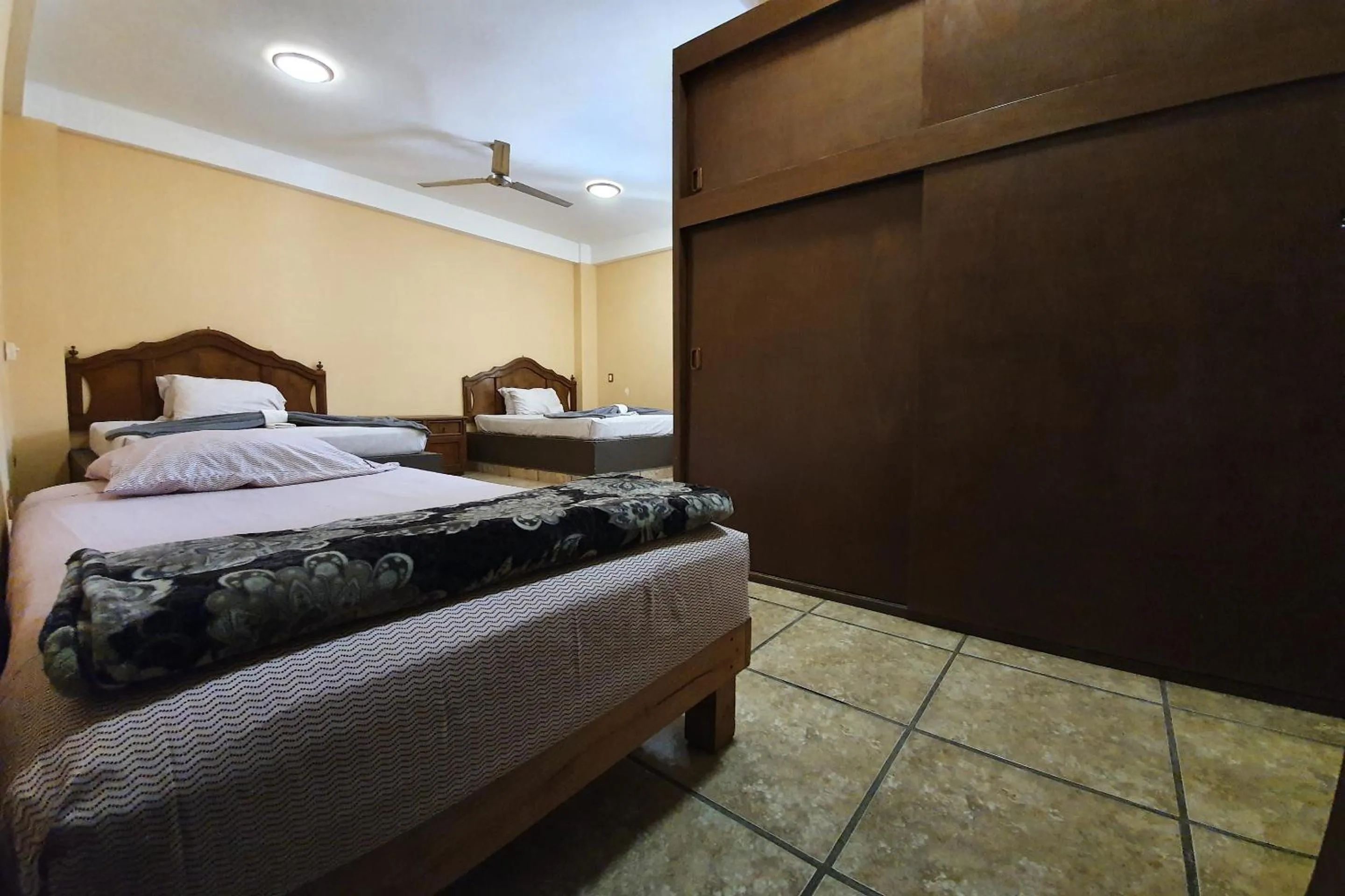 Bedroom, Bed in Hotel Colonos Los Cabos