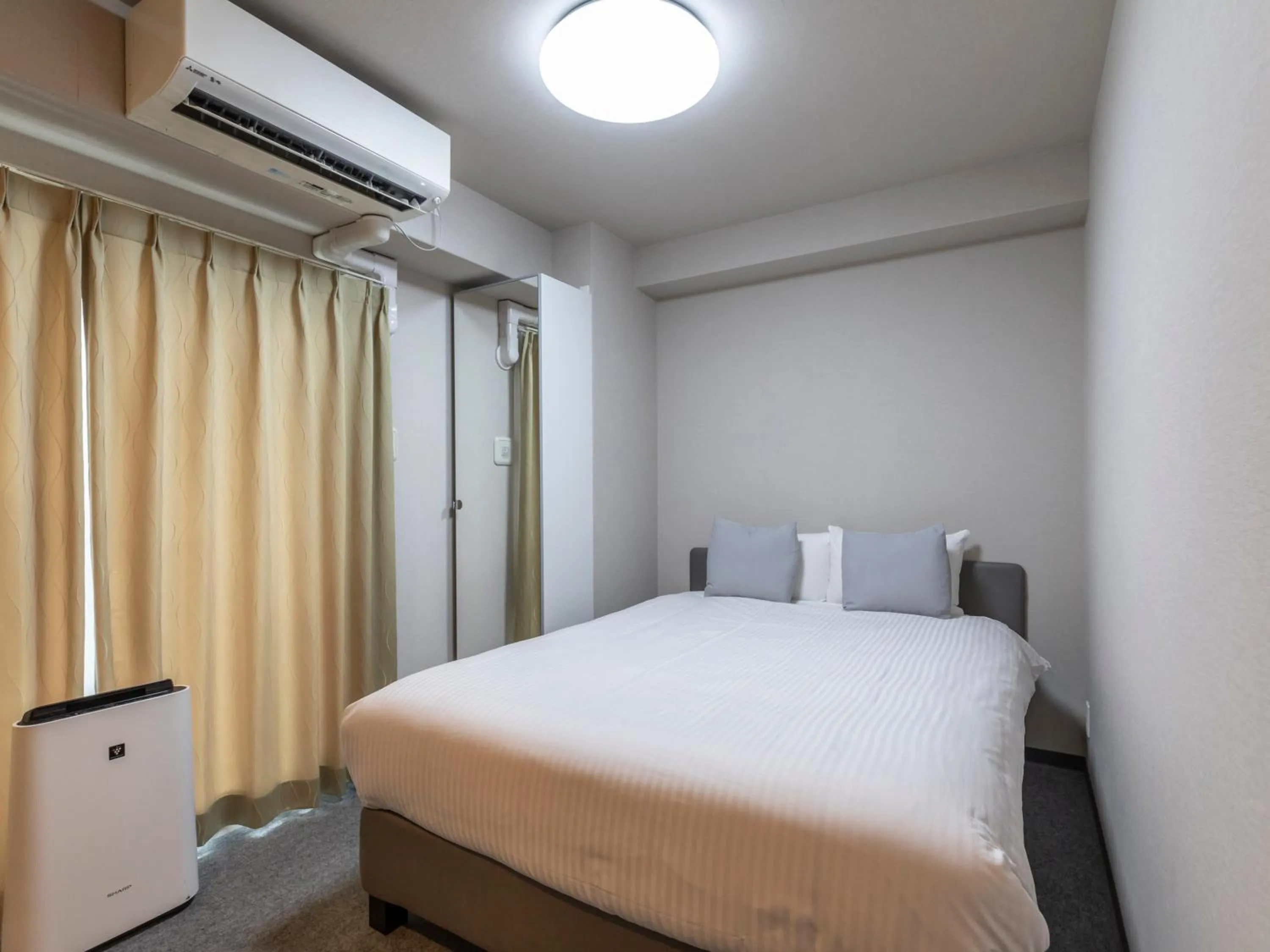 Photo of the whole room, Bed in Tabist Unihotel Midosuji Hommachi