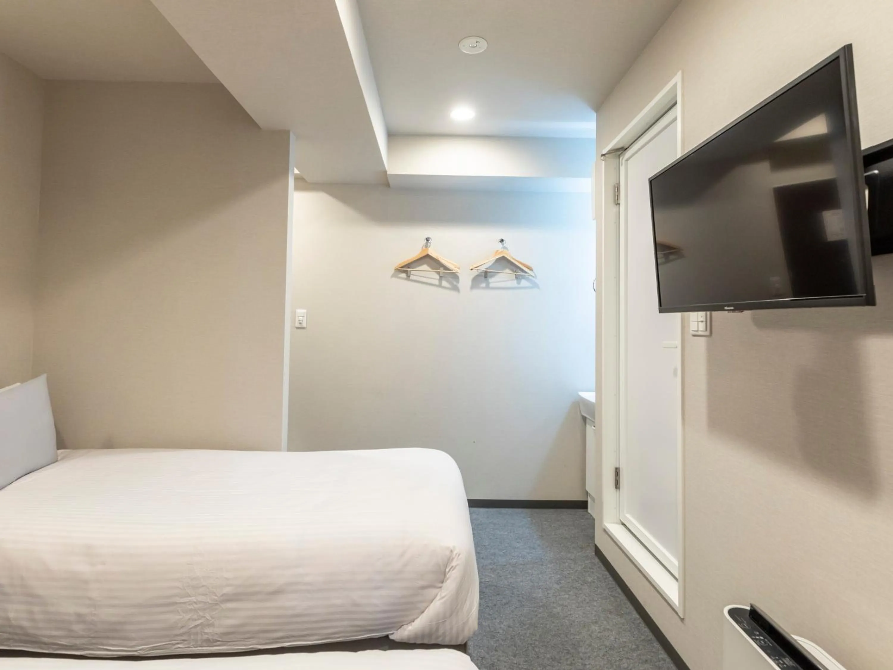 Photo of the whole room, Bed in Tabist Unihotel Midosuji Hommachi