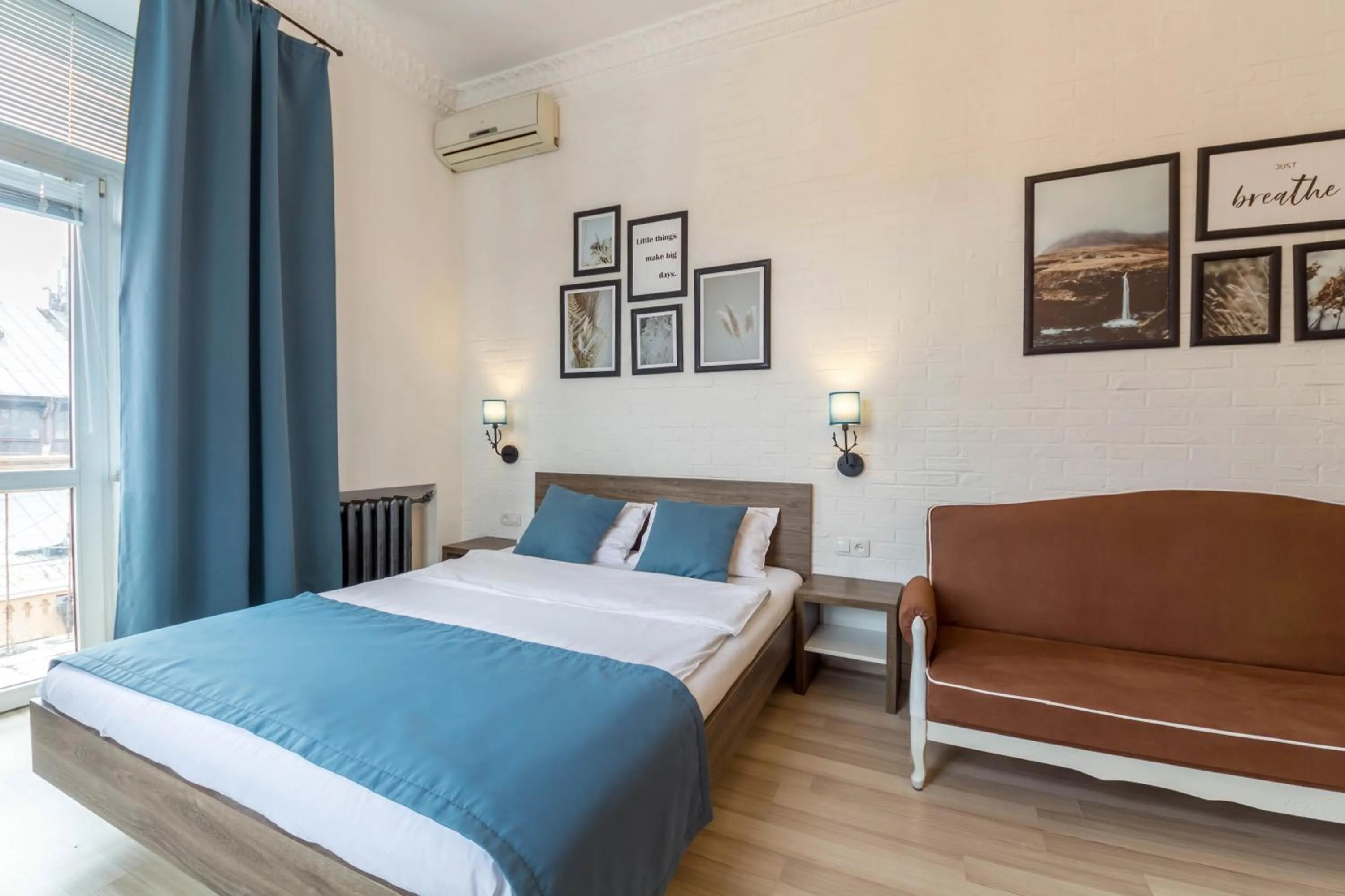 Bed in Scandinavian Apartments