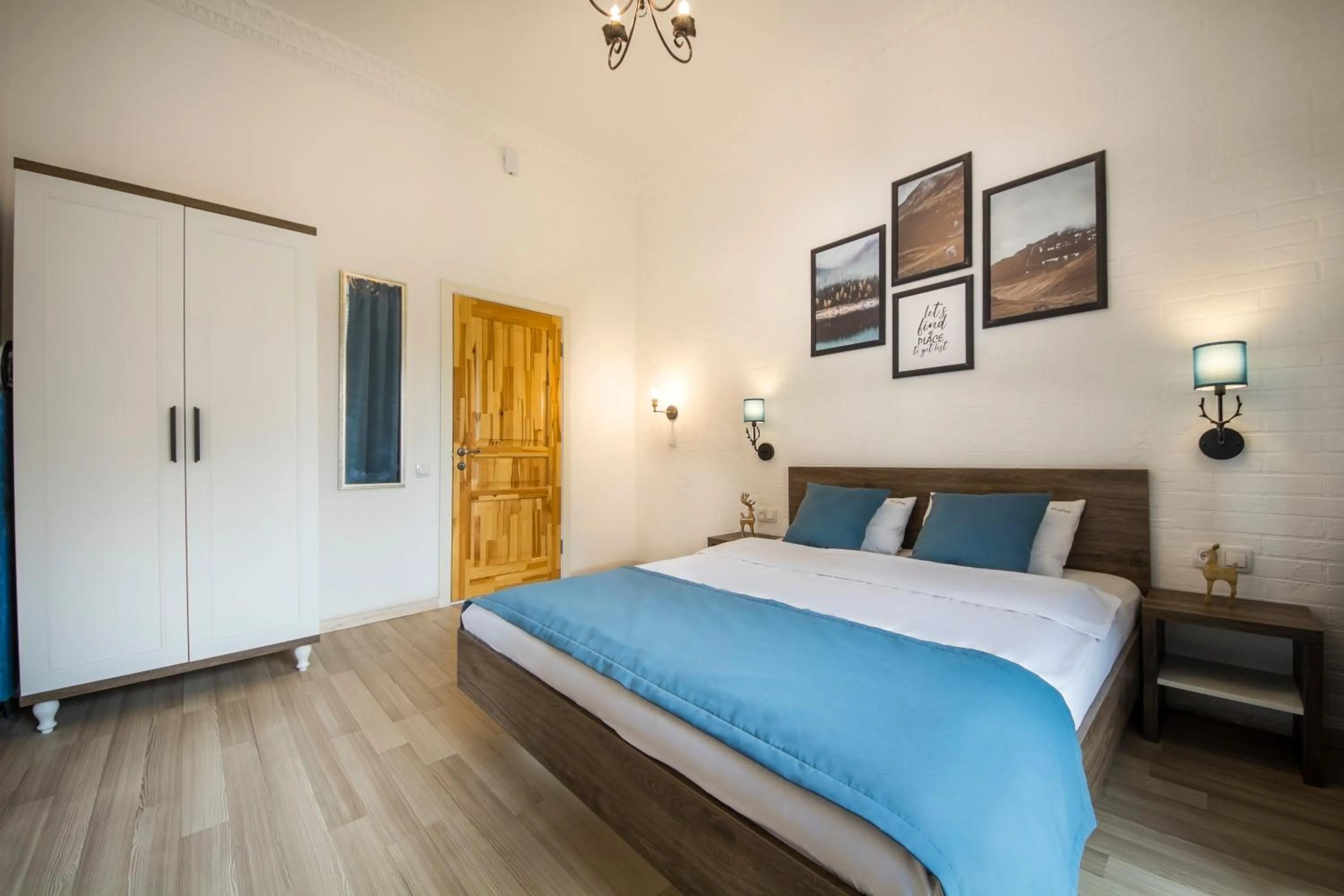 Bed in Scandinavian Apartments